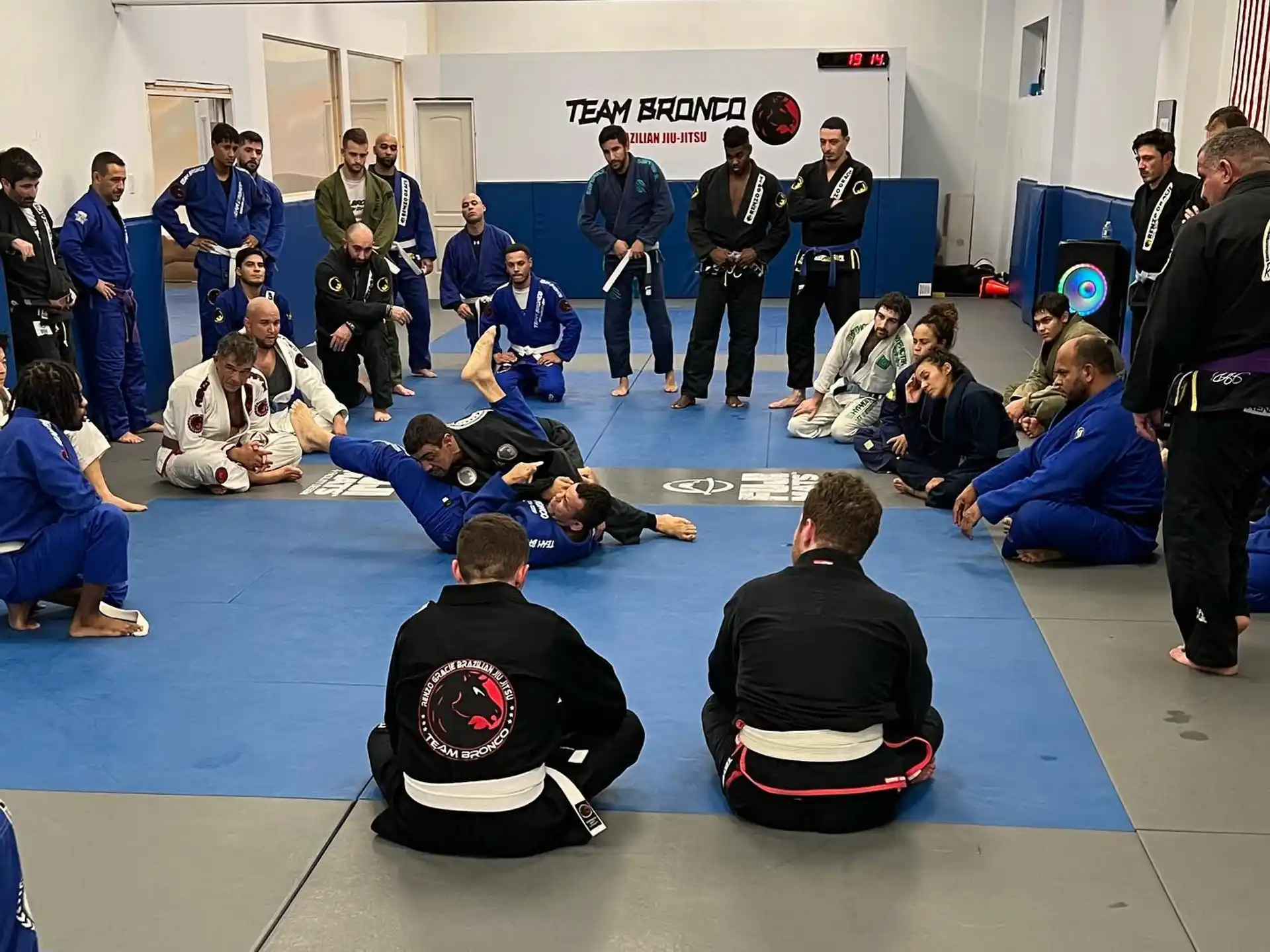 a group of people sitting on the floor