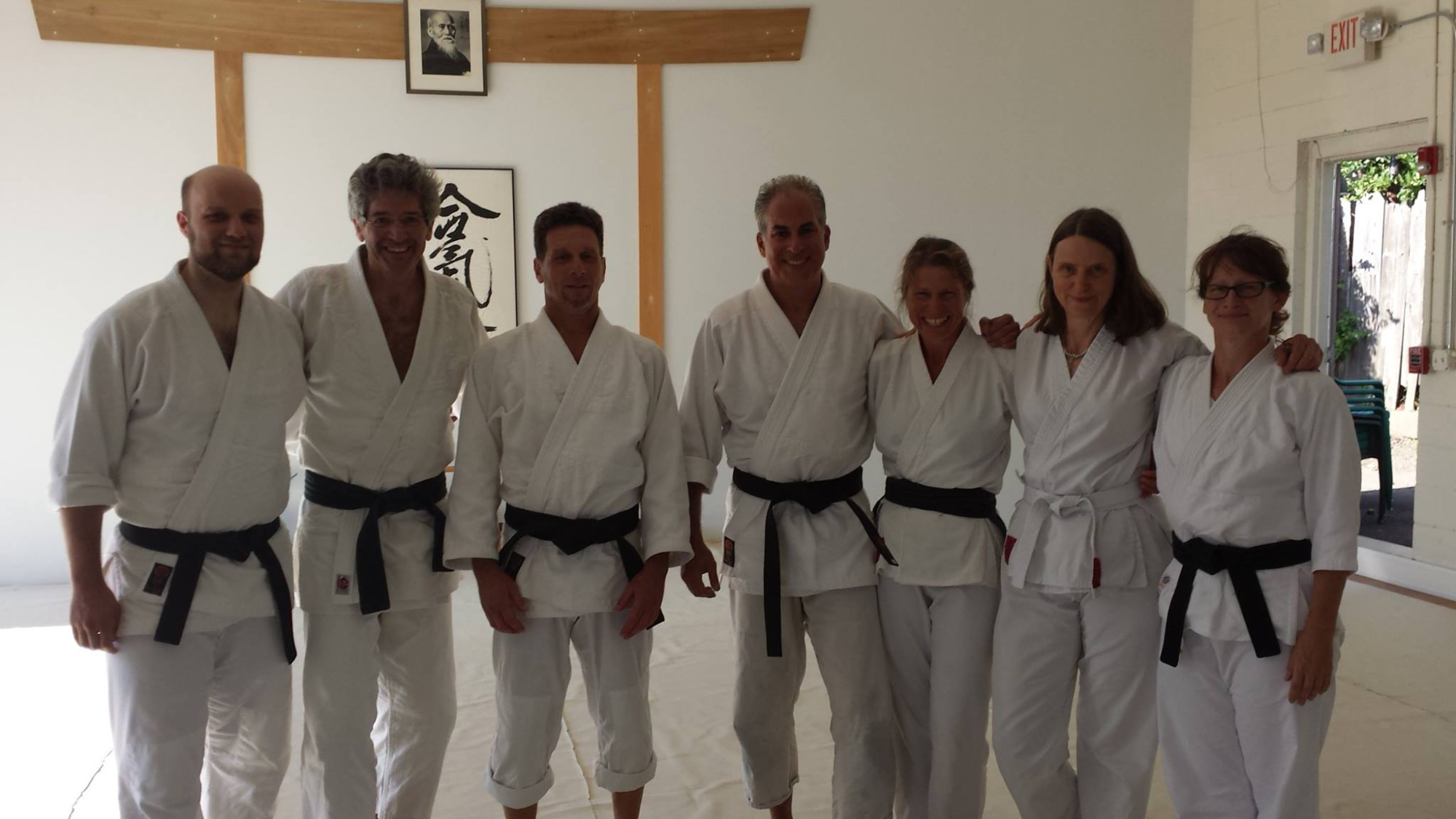 a group of people in white uniforms