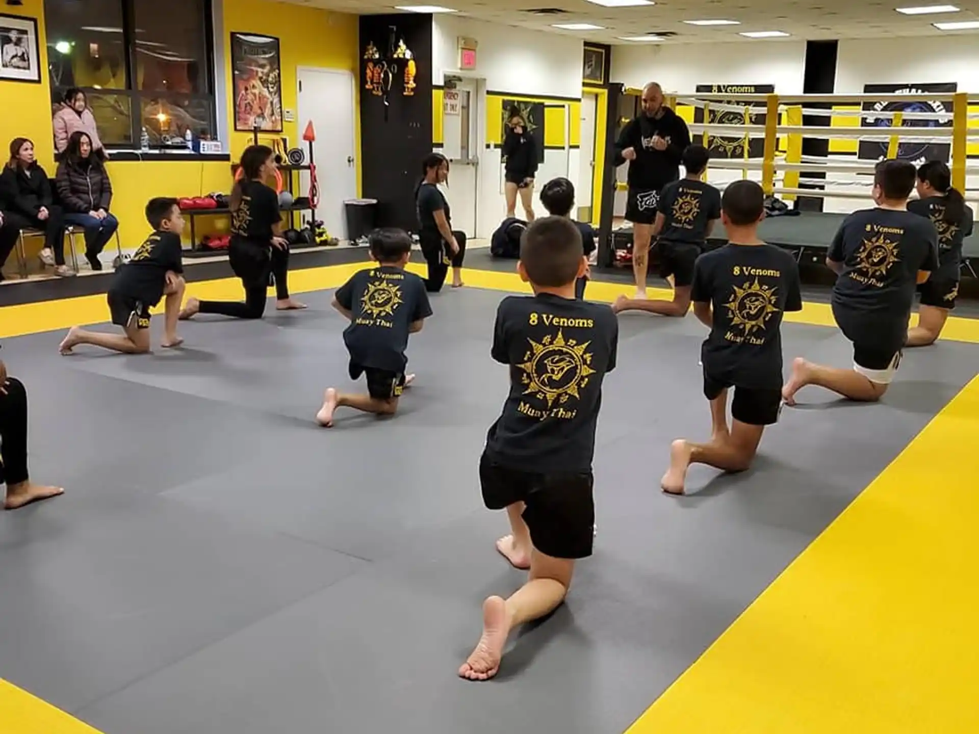 a group of people in a gym