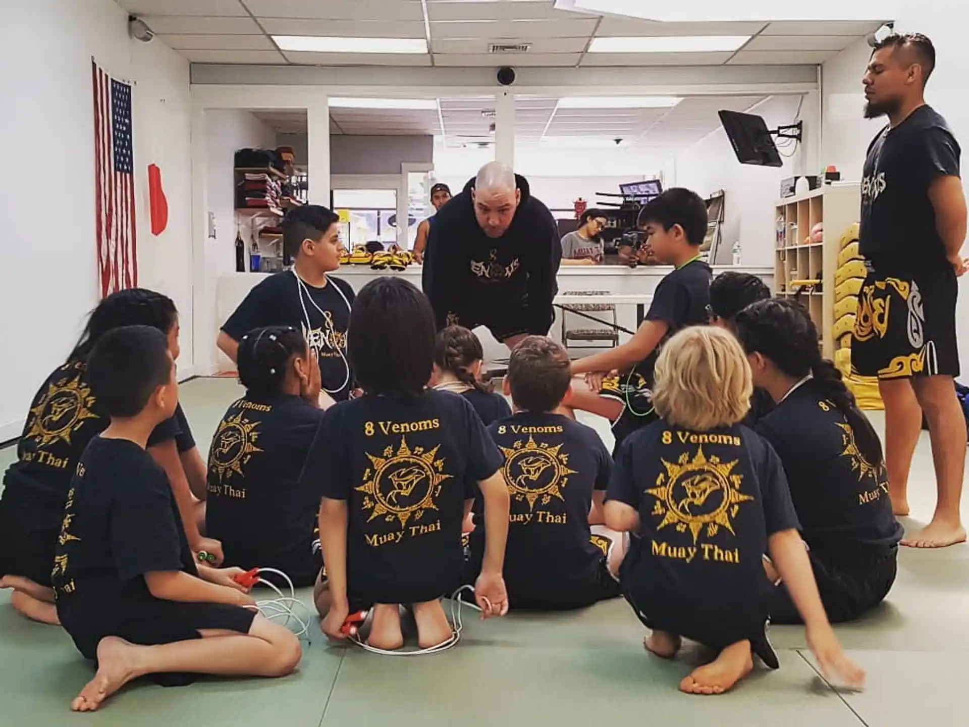 a group of people sitting on the floor