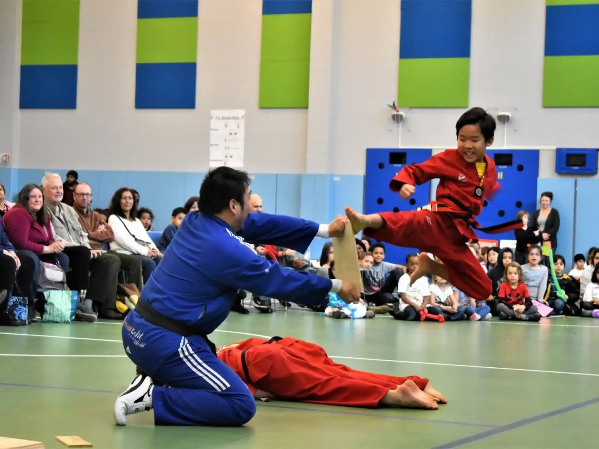 a couple of men in a karate class
