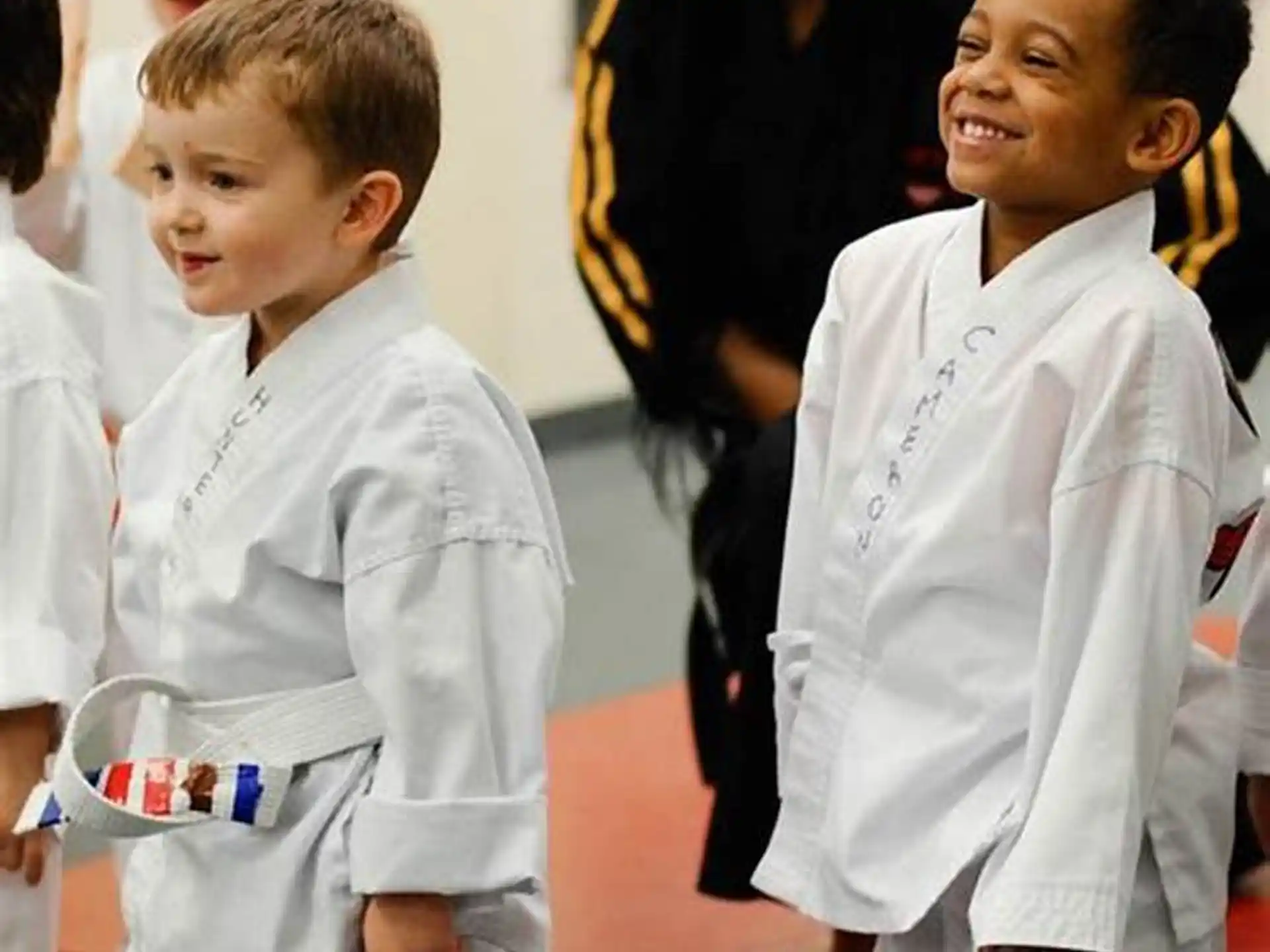 a boy wearing a white shirt