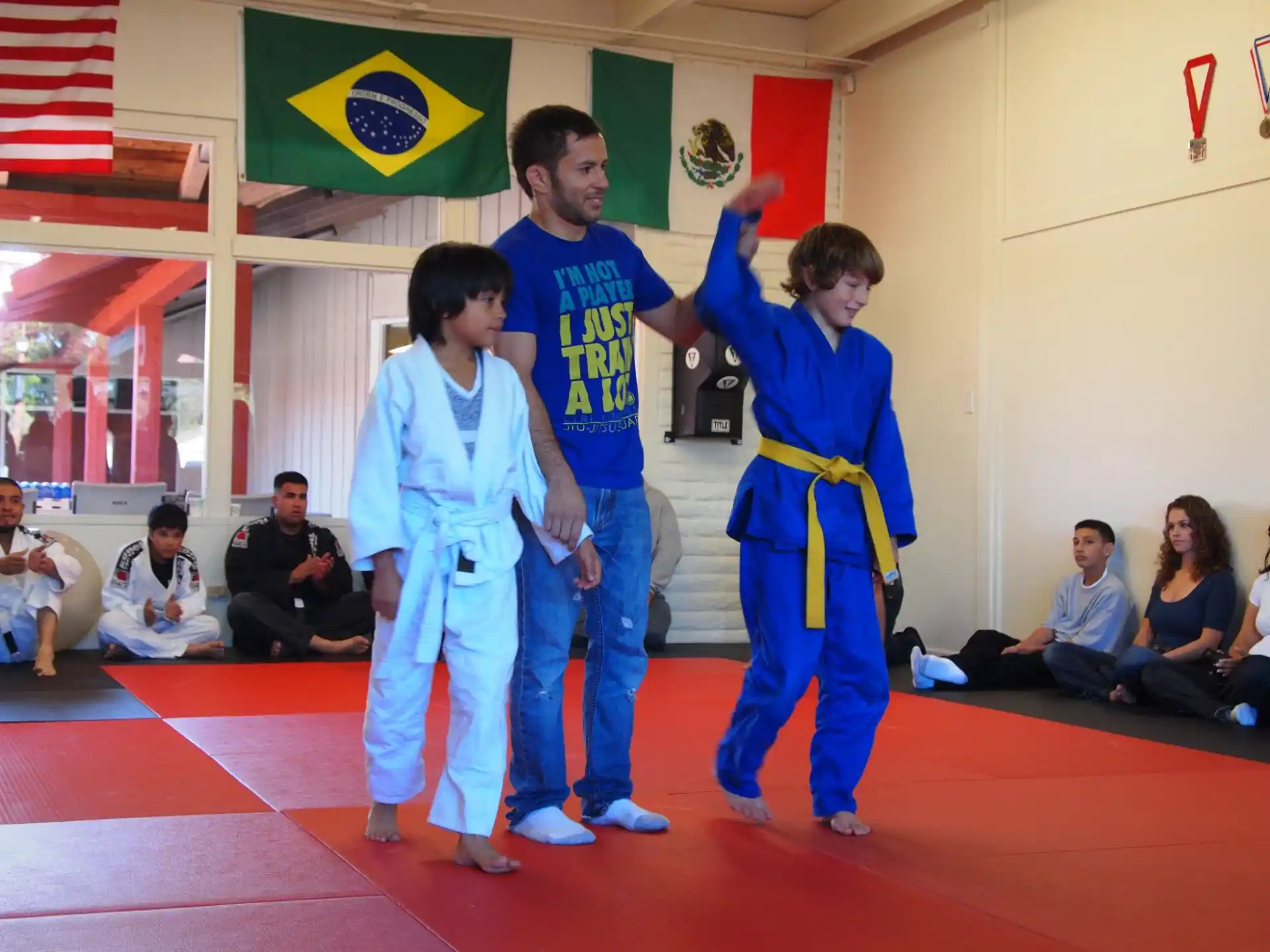 a group of boys in karate uniforms