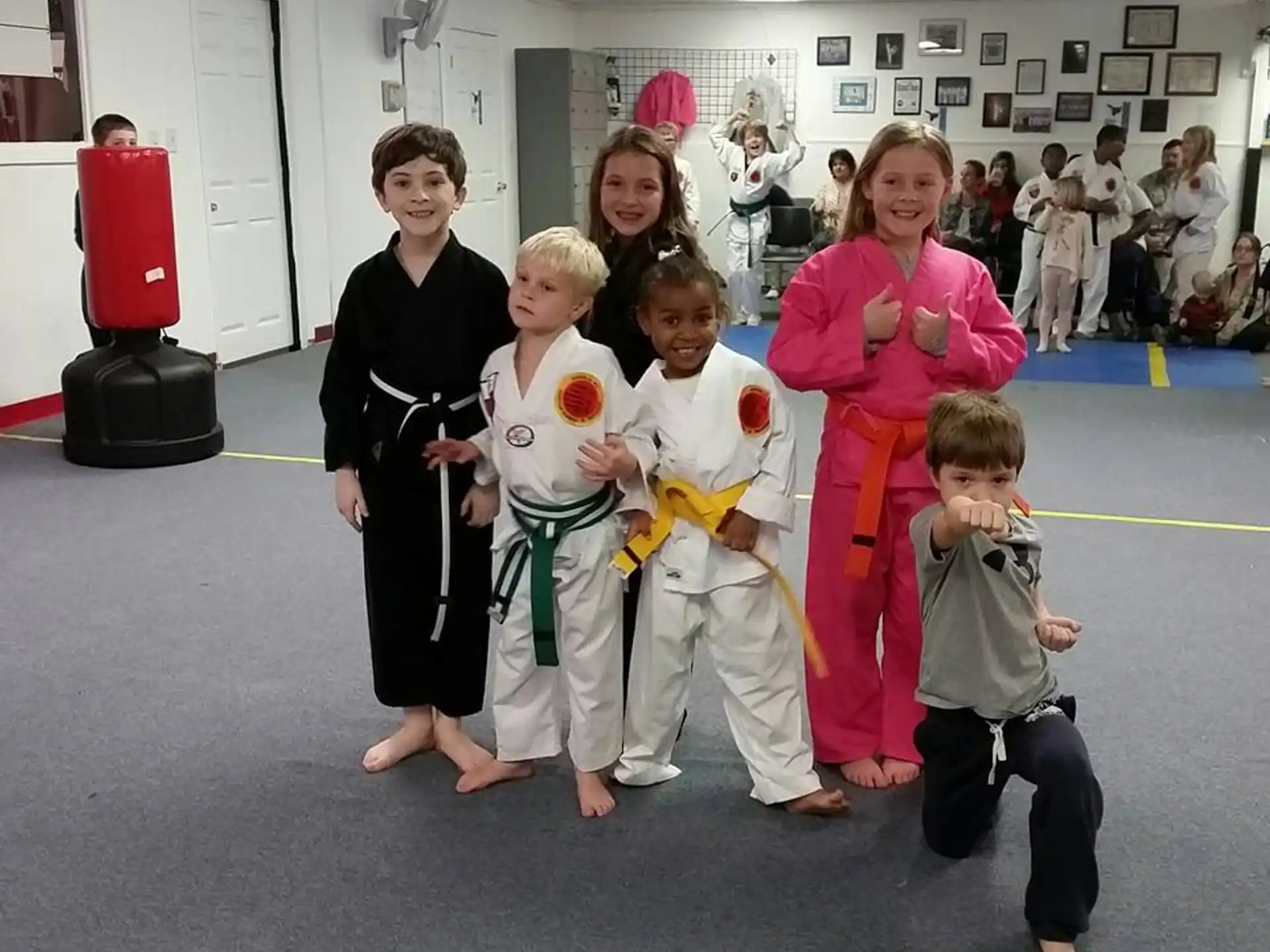a group of children posing for a photo
