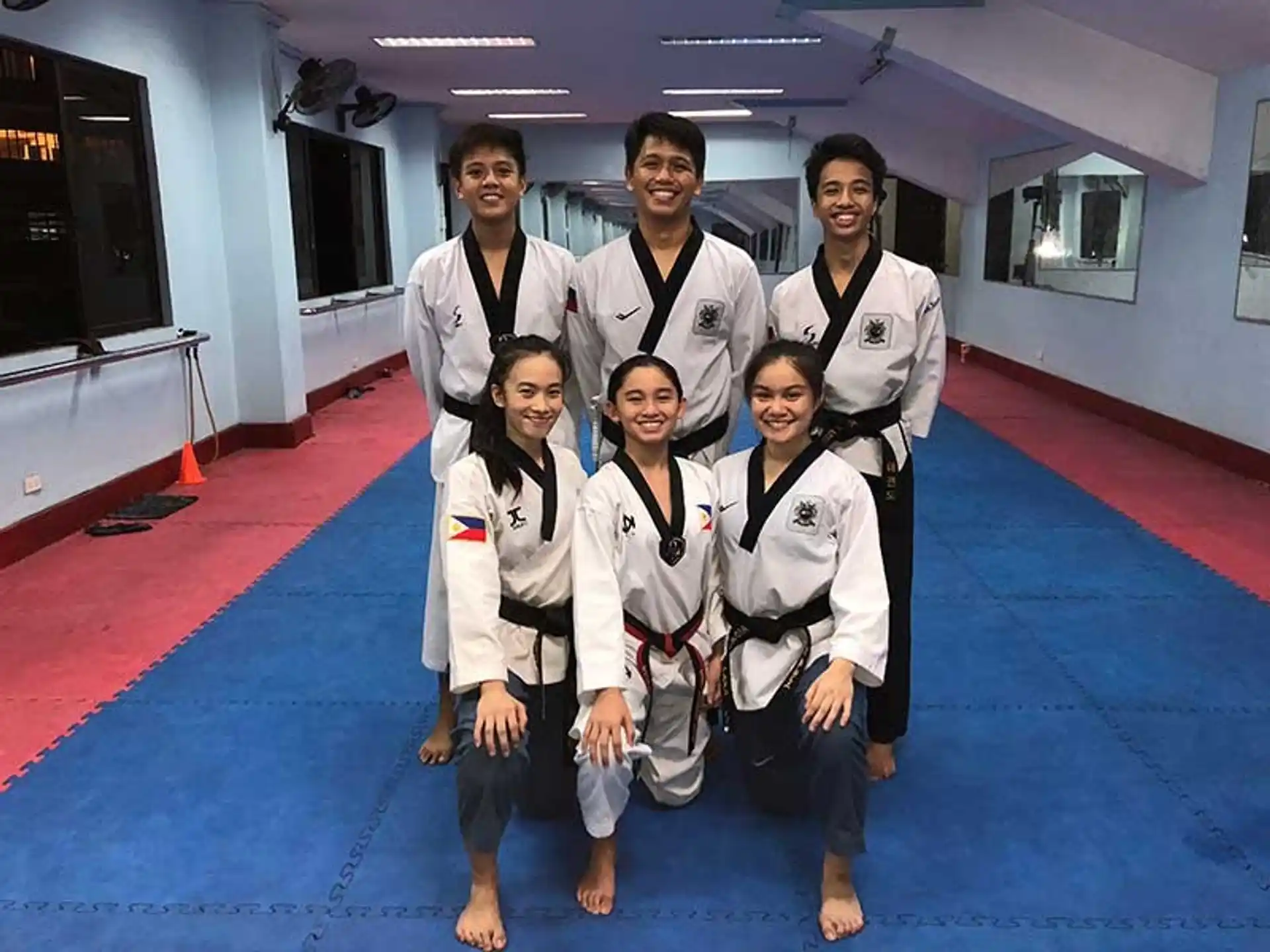 a group of people wearing karate uniforms