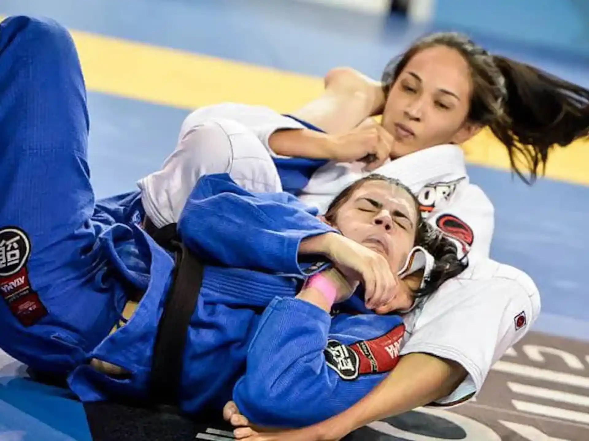 a group of women wrestling