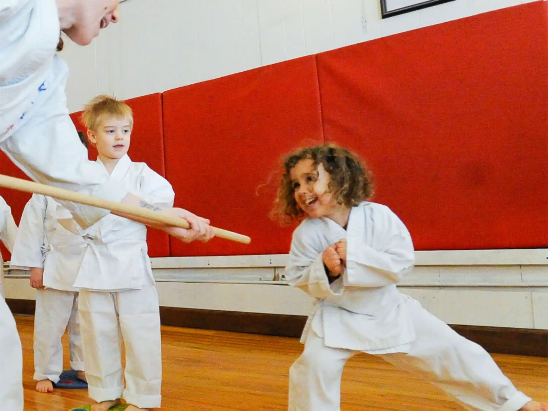 a man and a child in karate uniforms