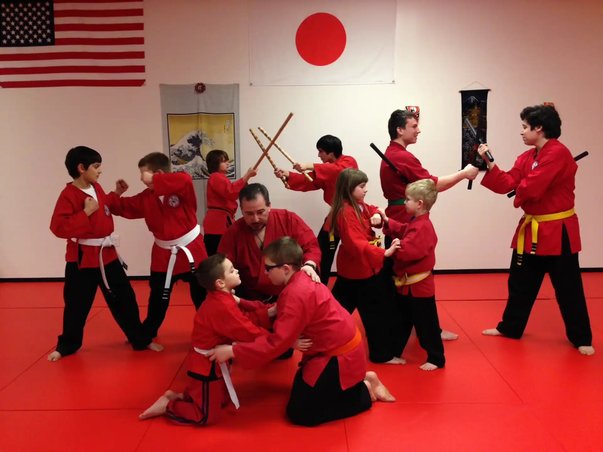 a group of people in red uniforms