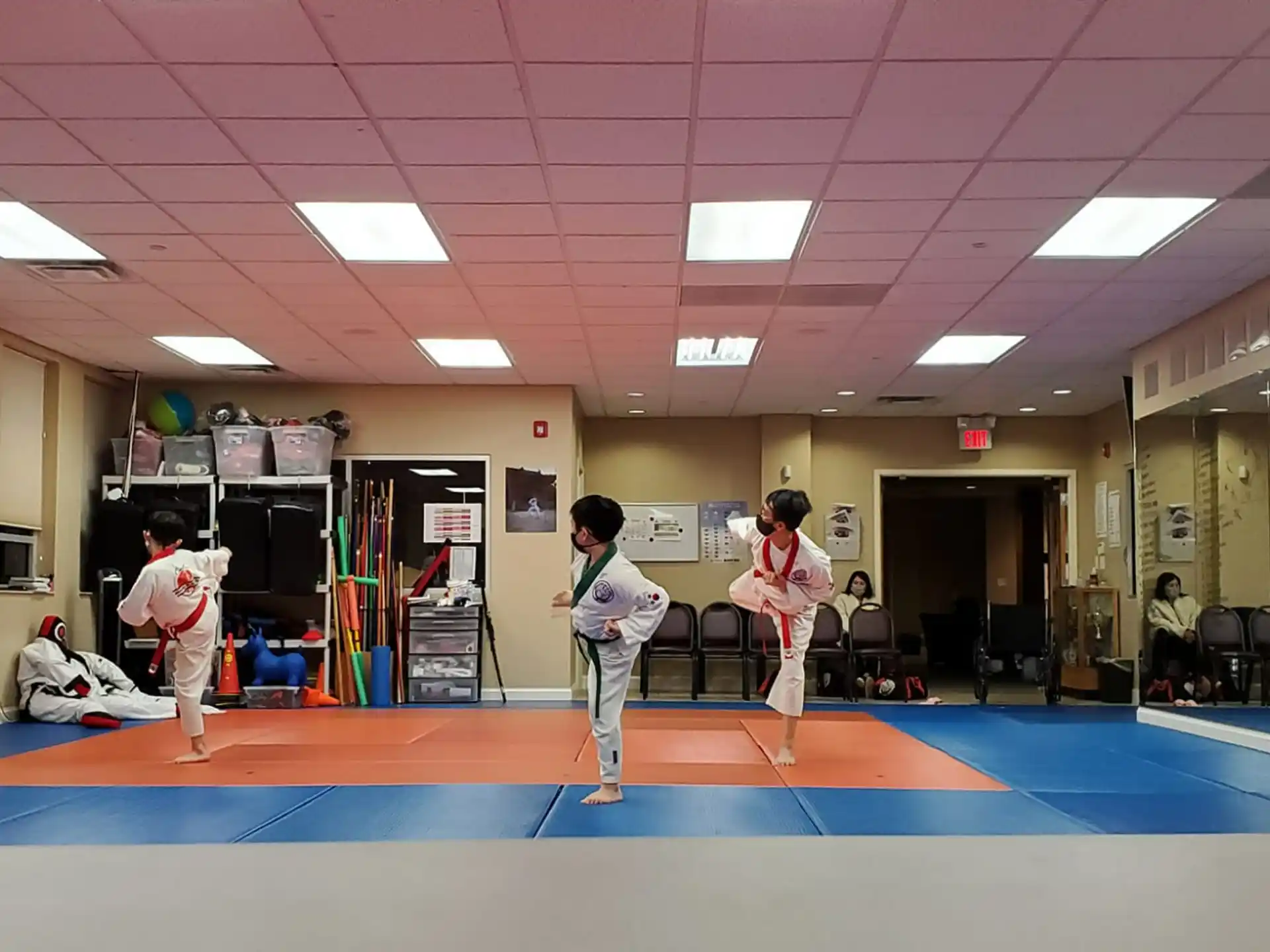 a group of people in karate uniforms