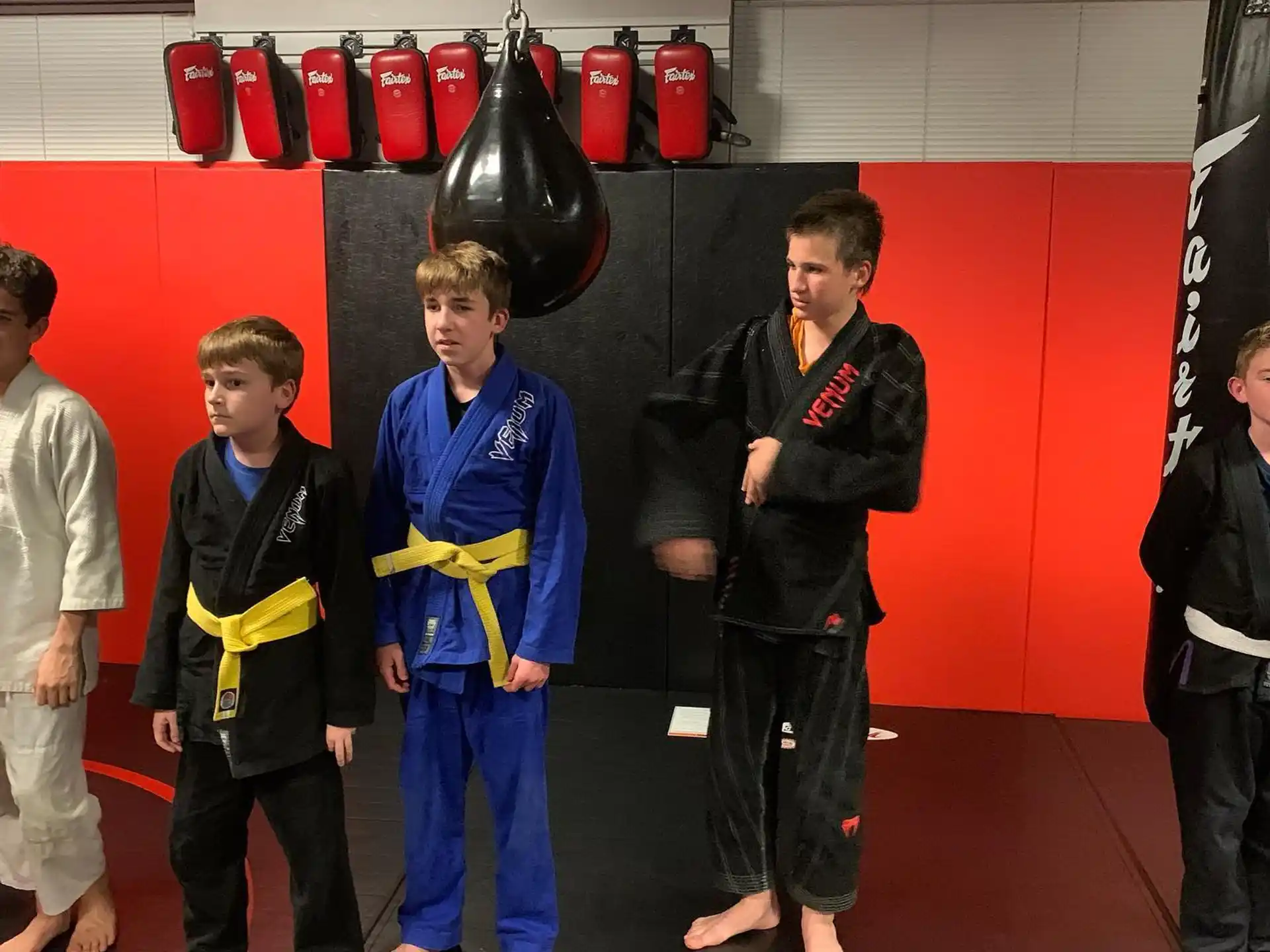 a group of boys posing for a picture