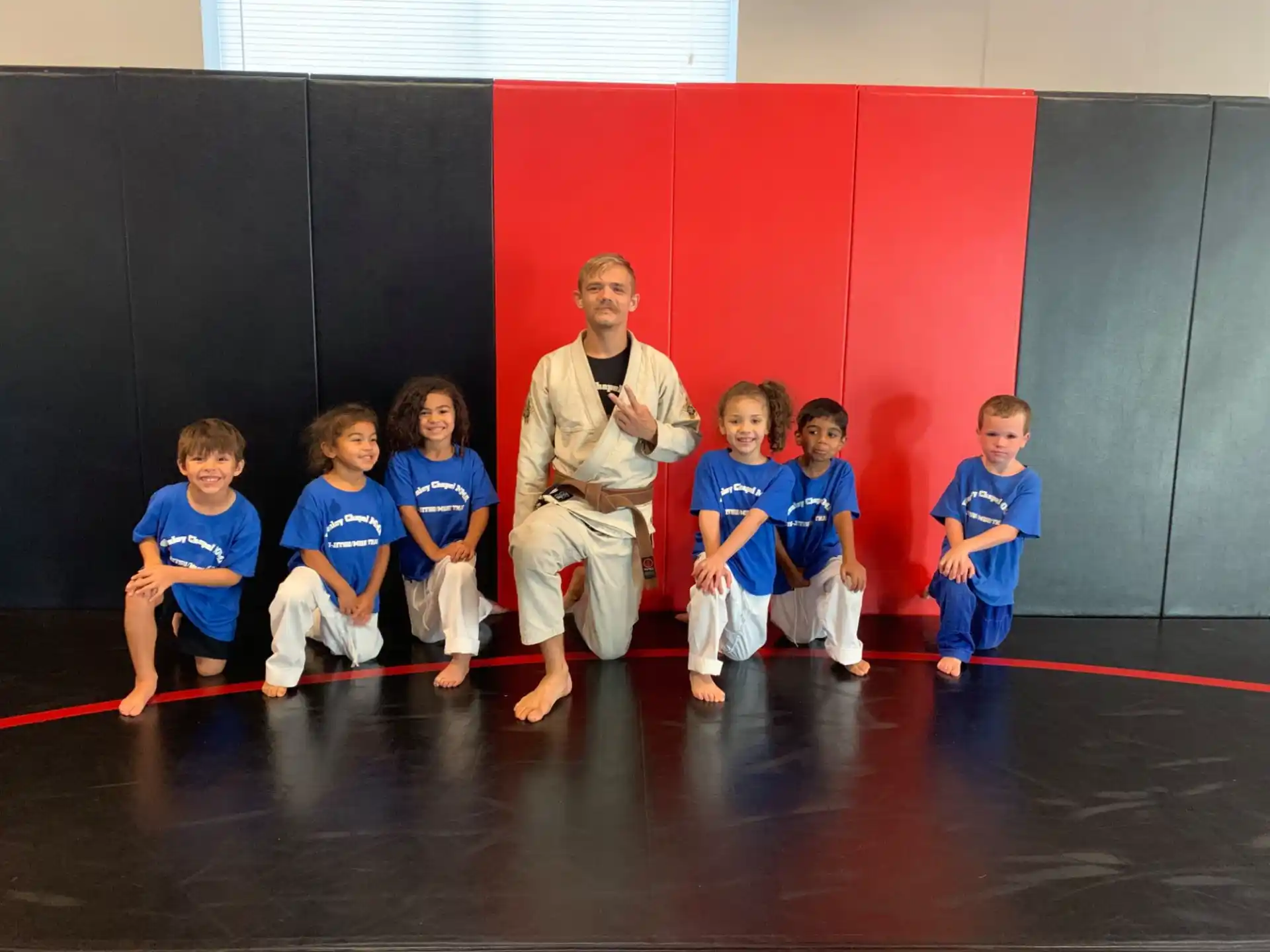 a person standing with kids
