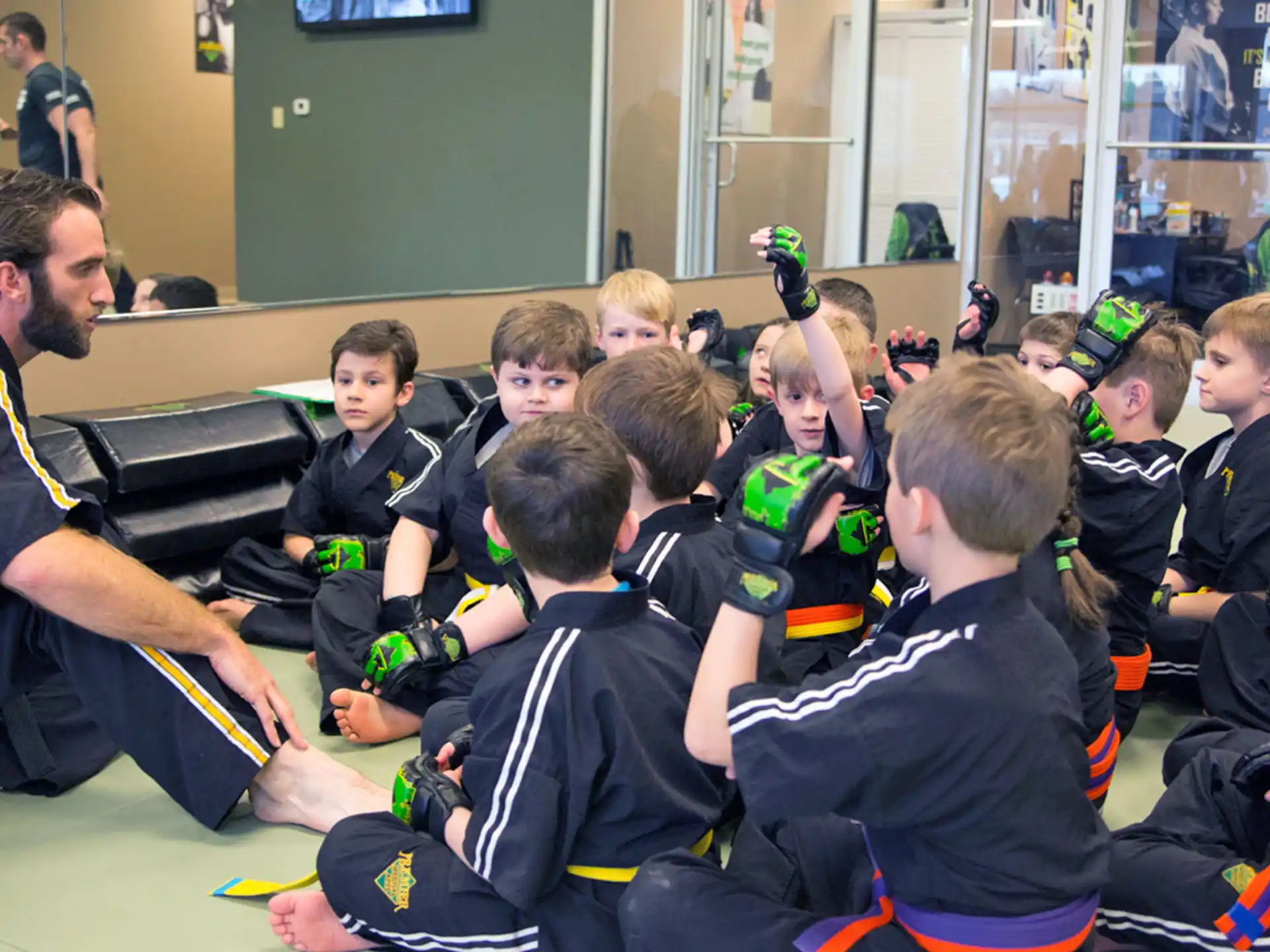 a group of people sitting on the floor