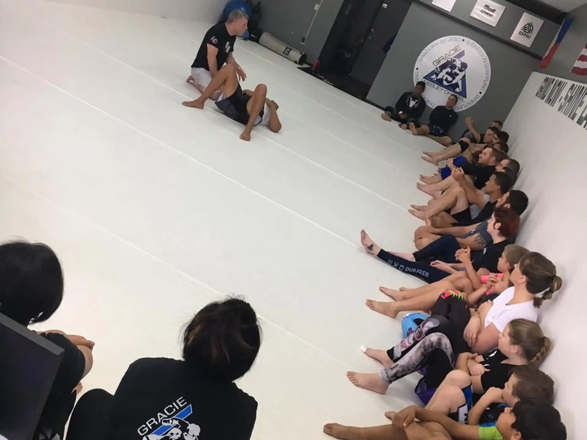 a group of people sitting in a circle in a circle