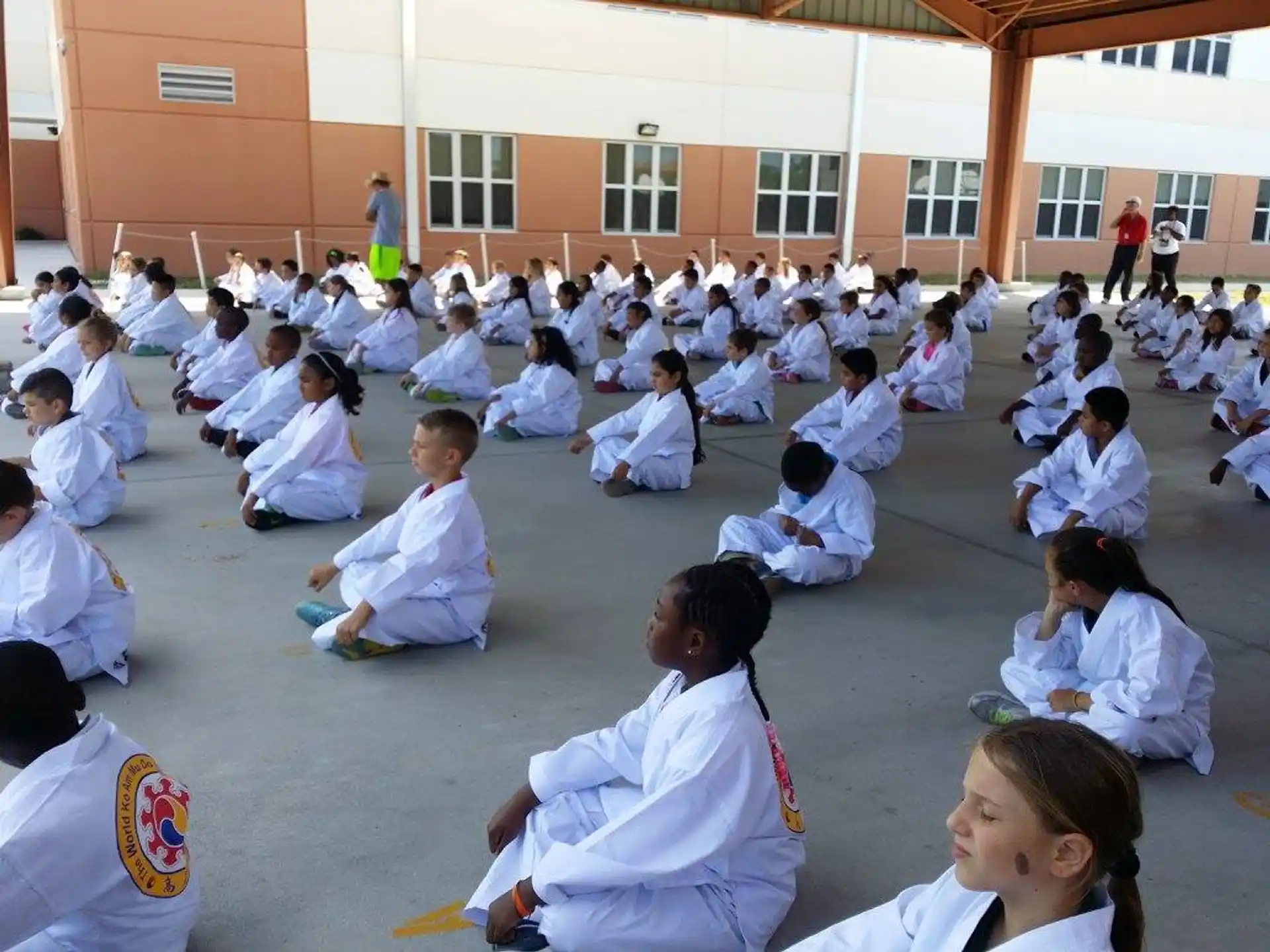 a group of people sitting in a circle