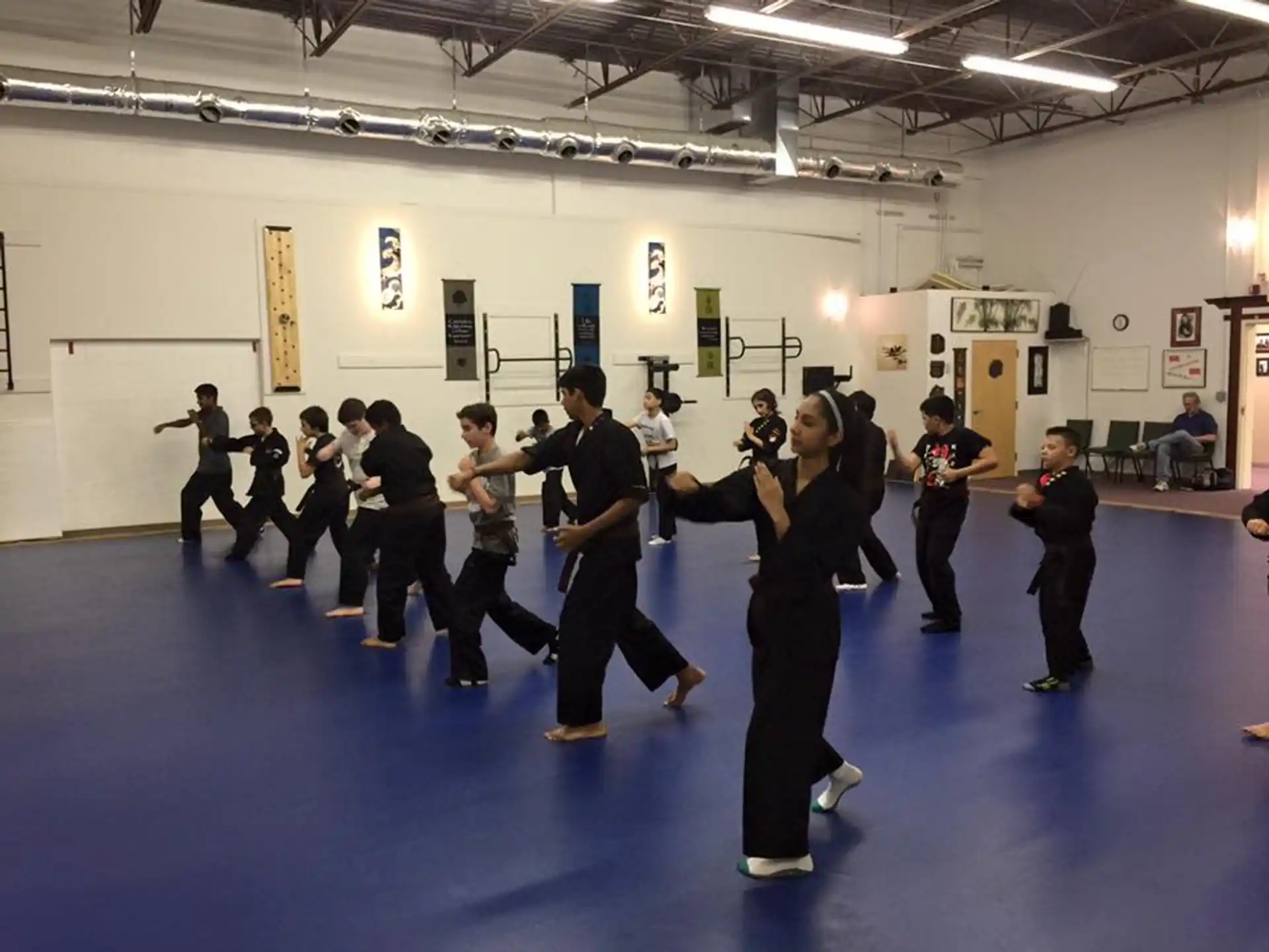 a group of people dancing in a room