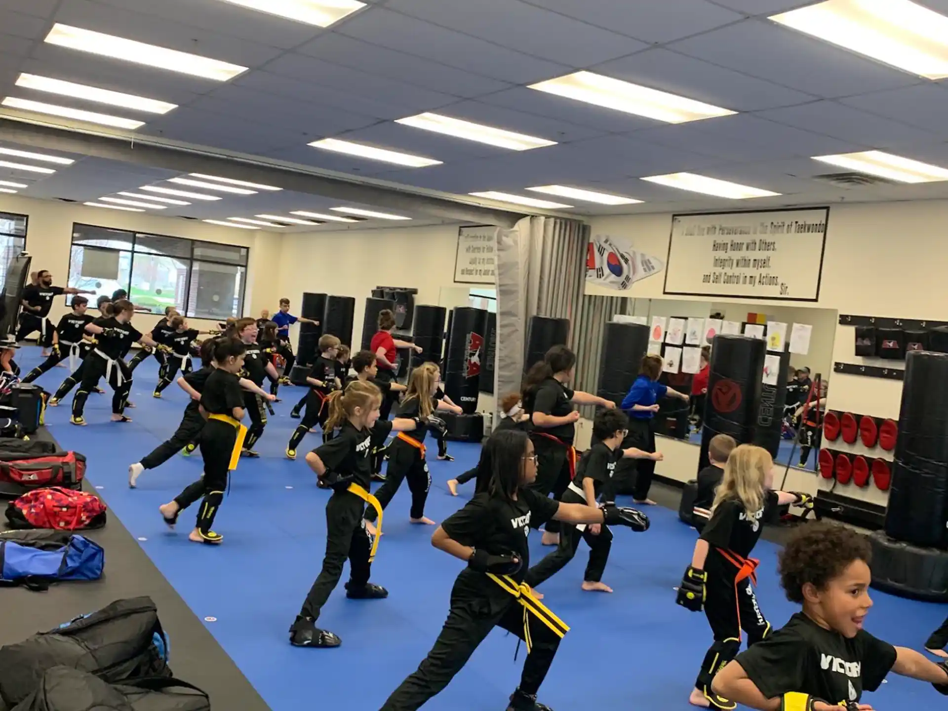 a group of kids in a gym