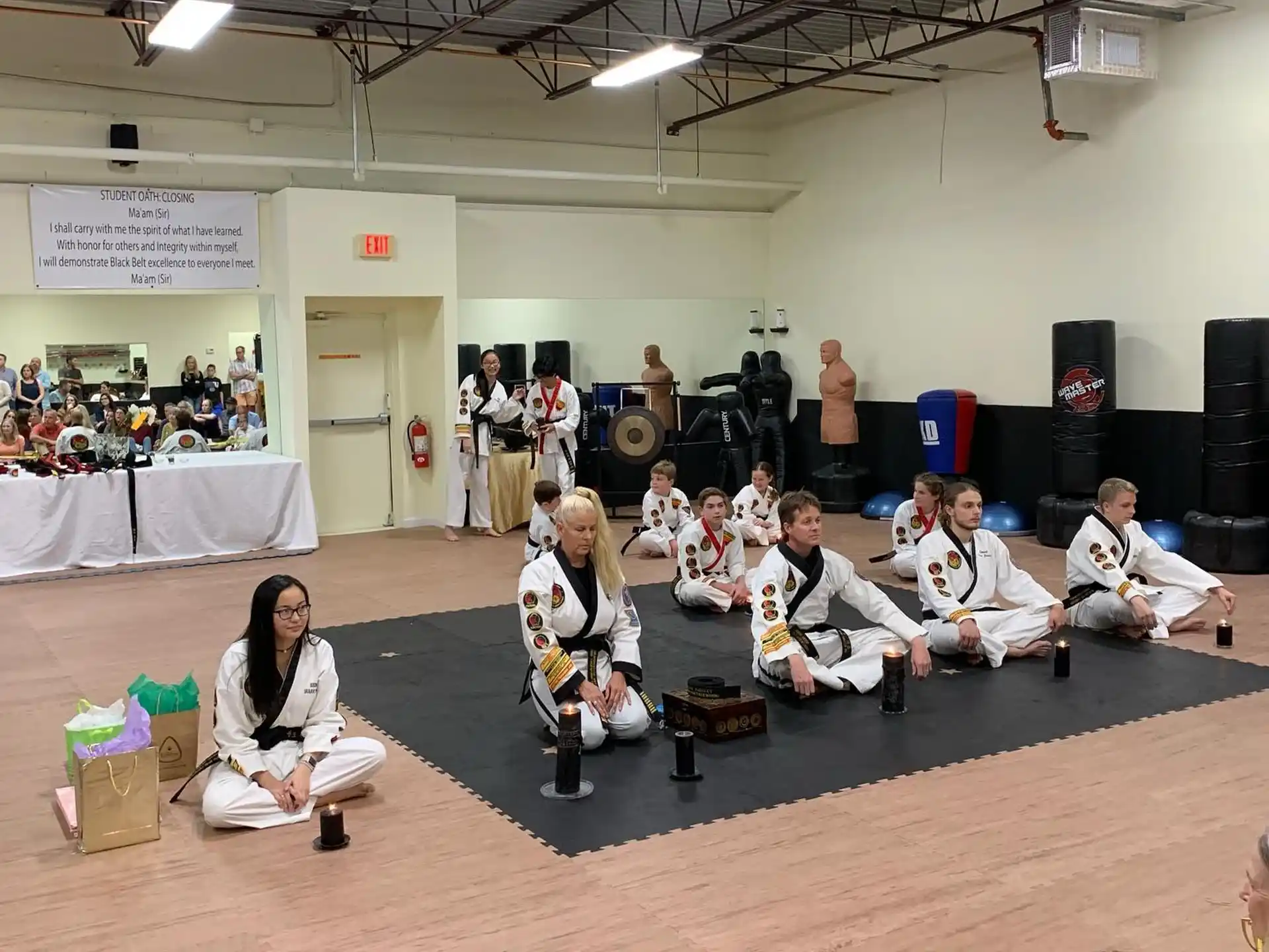 a group of people sitting on the floor