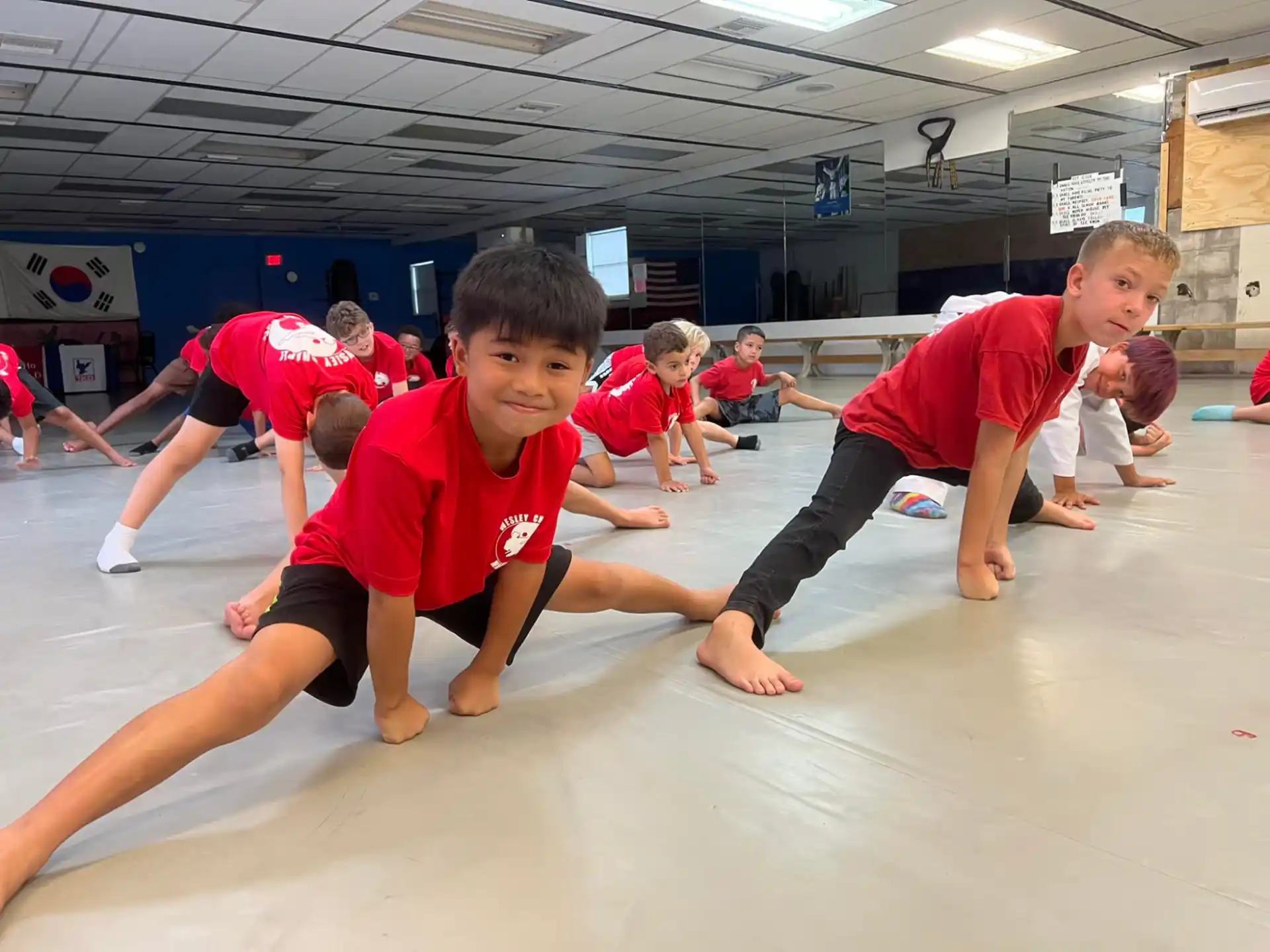 a group of kids in a gym