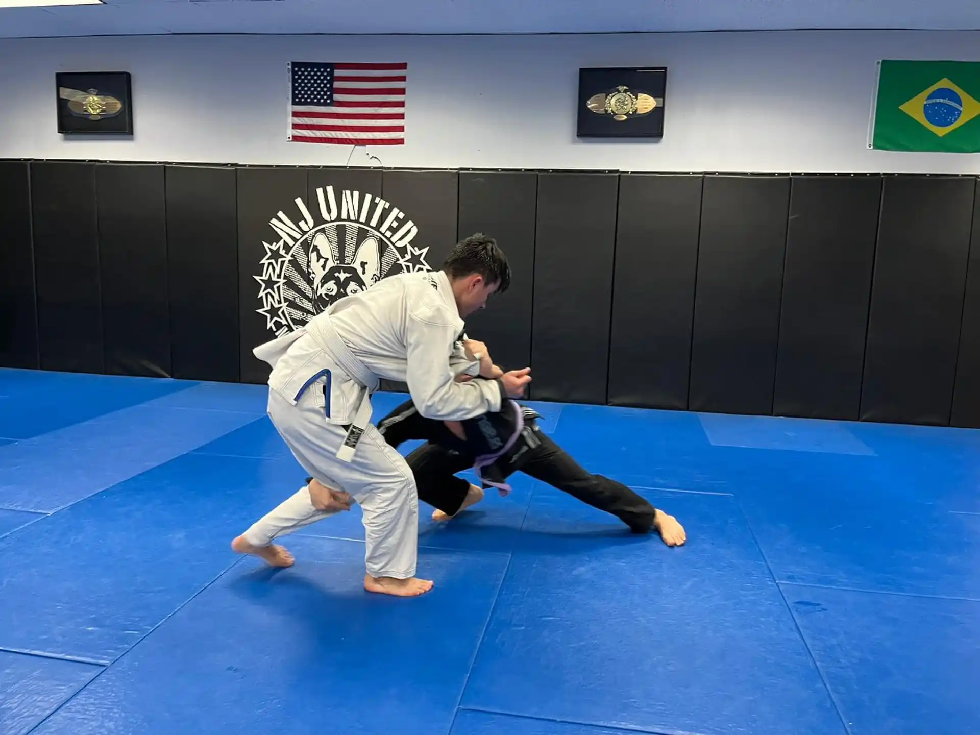 two people in karate uniforms