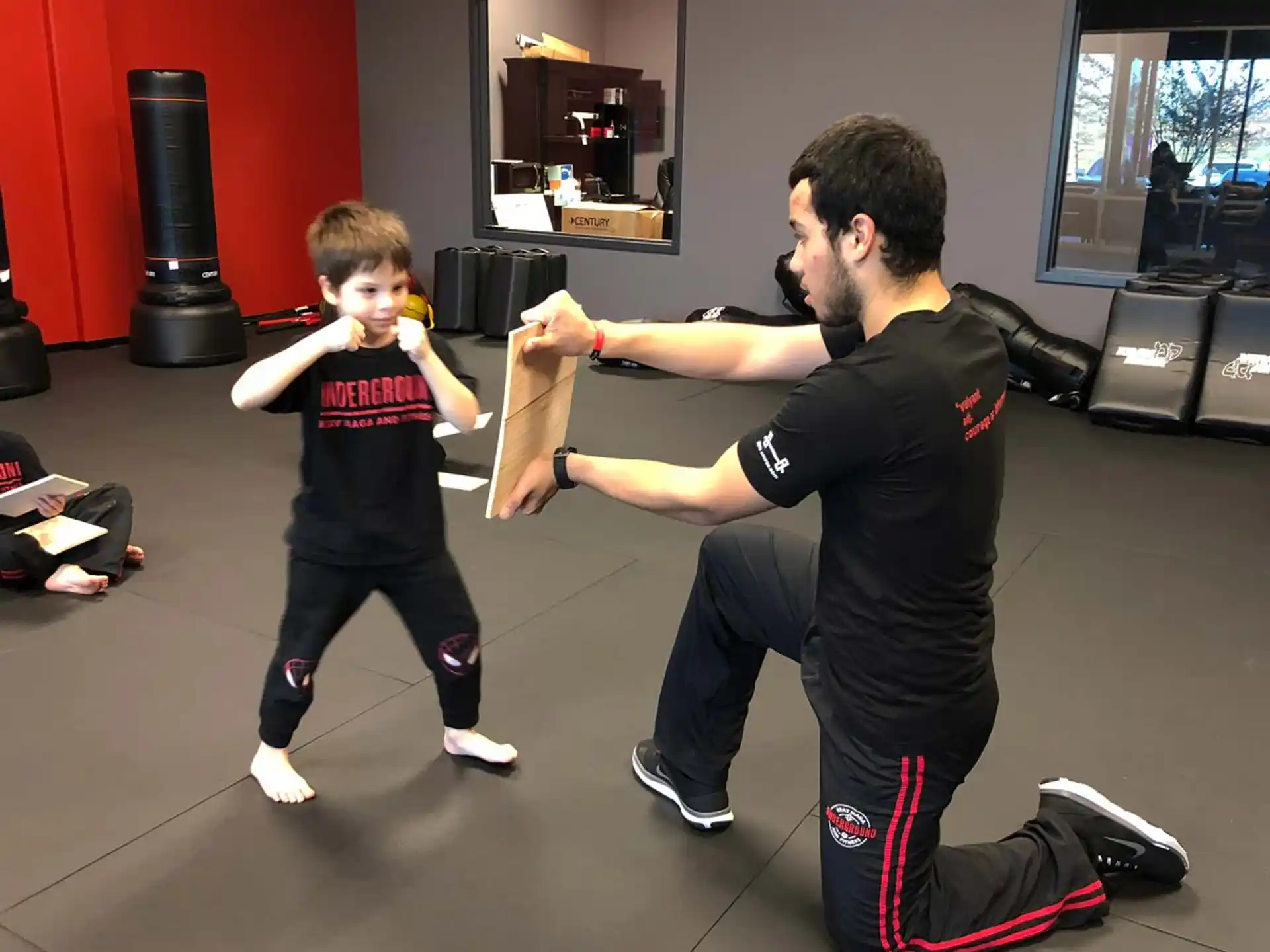a person and a child dancing