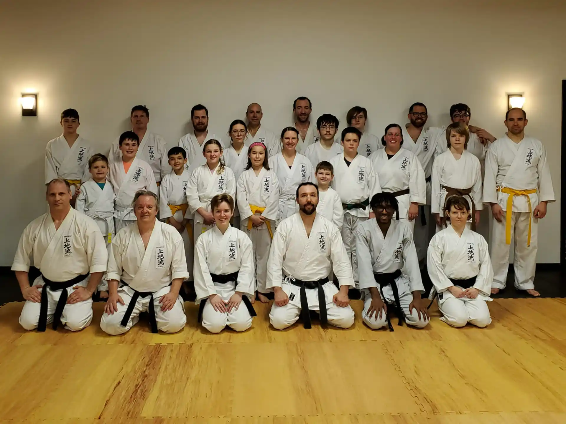 a group of people wearing white uniforms