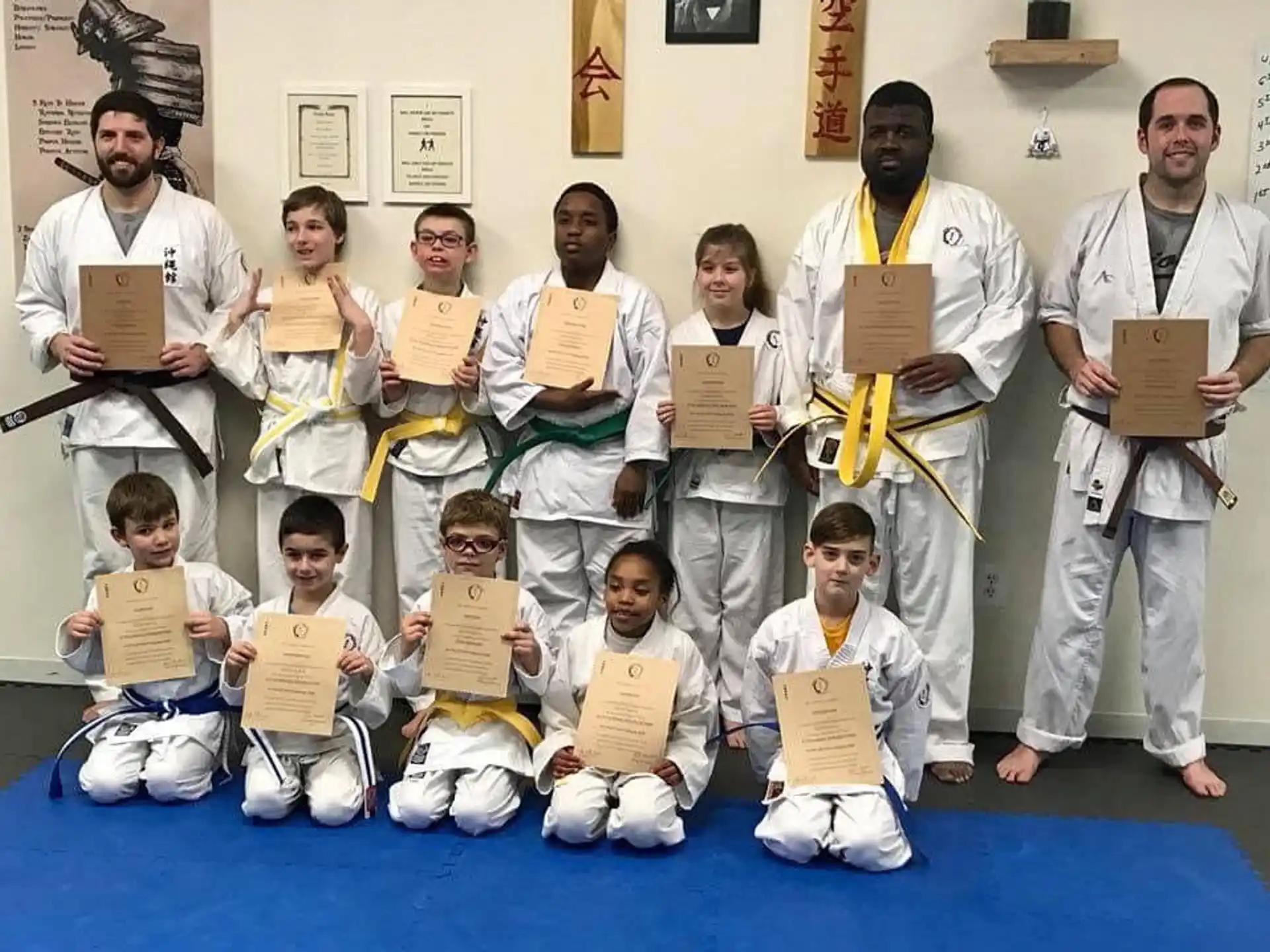 a group of people wearing karate uniforms