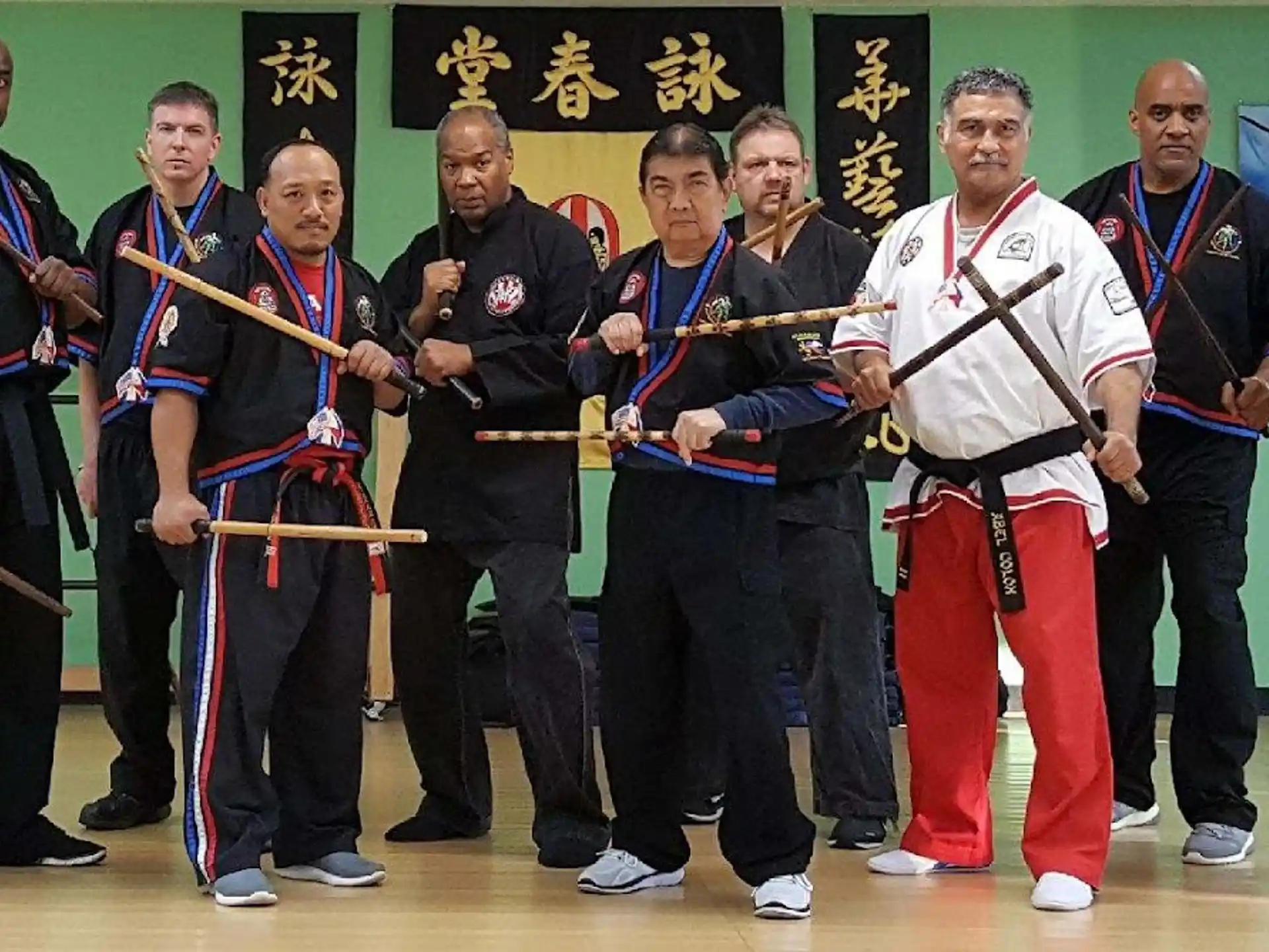 a group of men holding swords