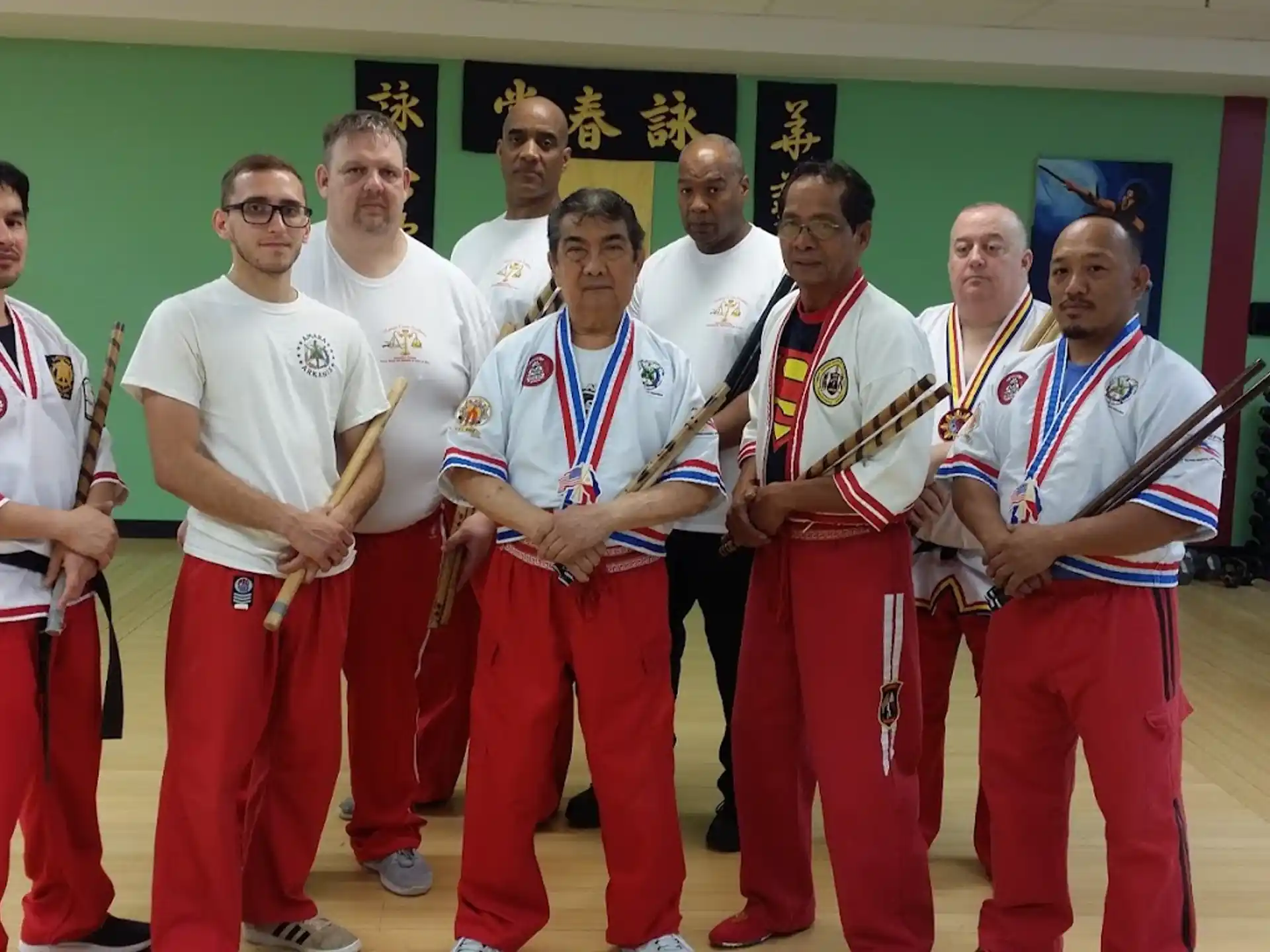 a group of men wearing medals