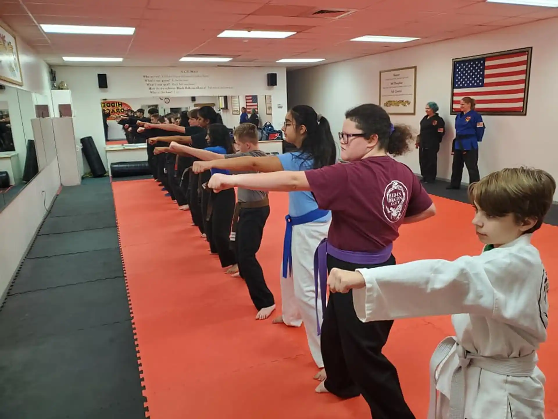 a group of people in a gym