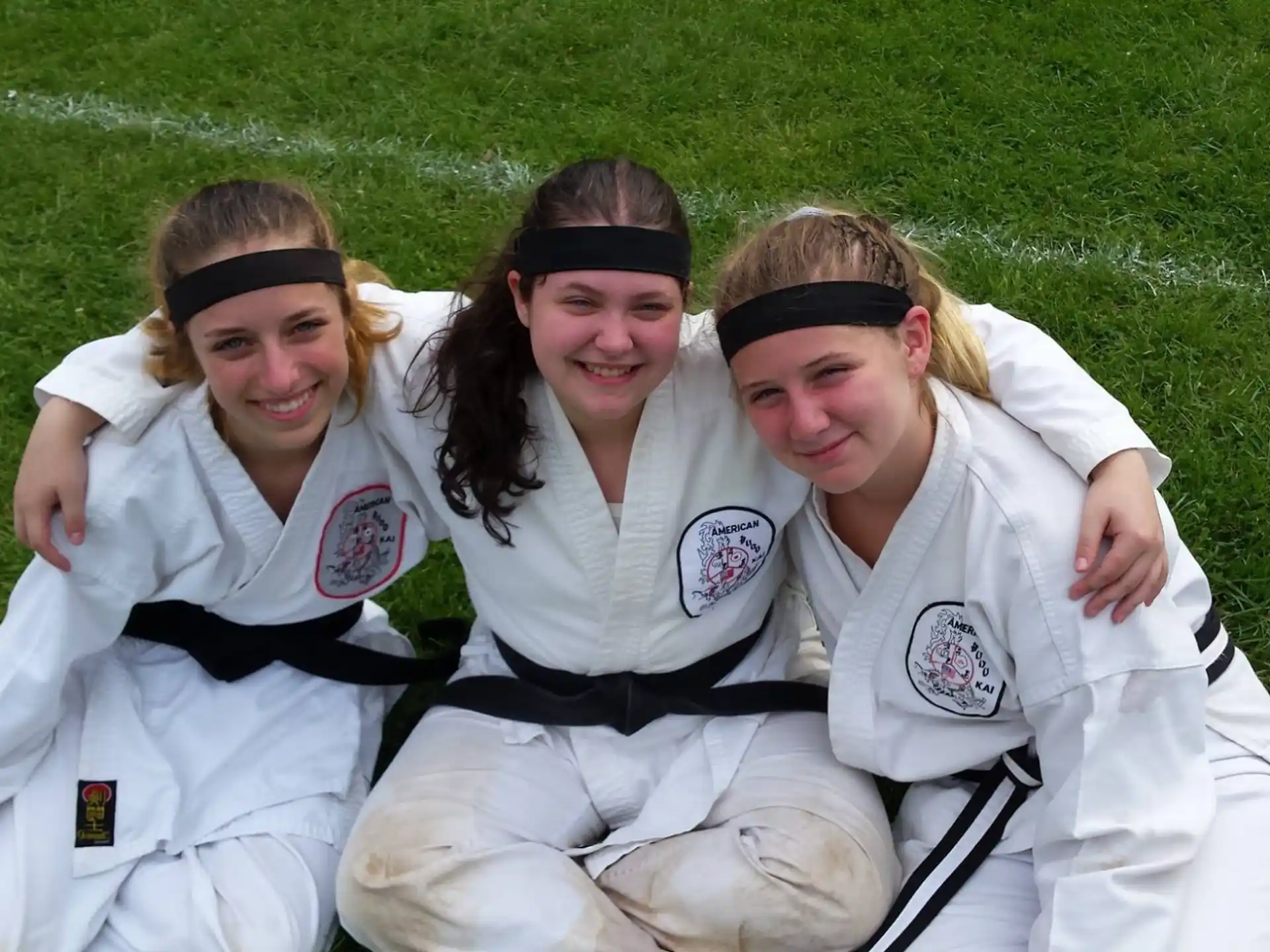a group of women in white uniforms