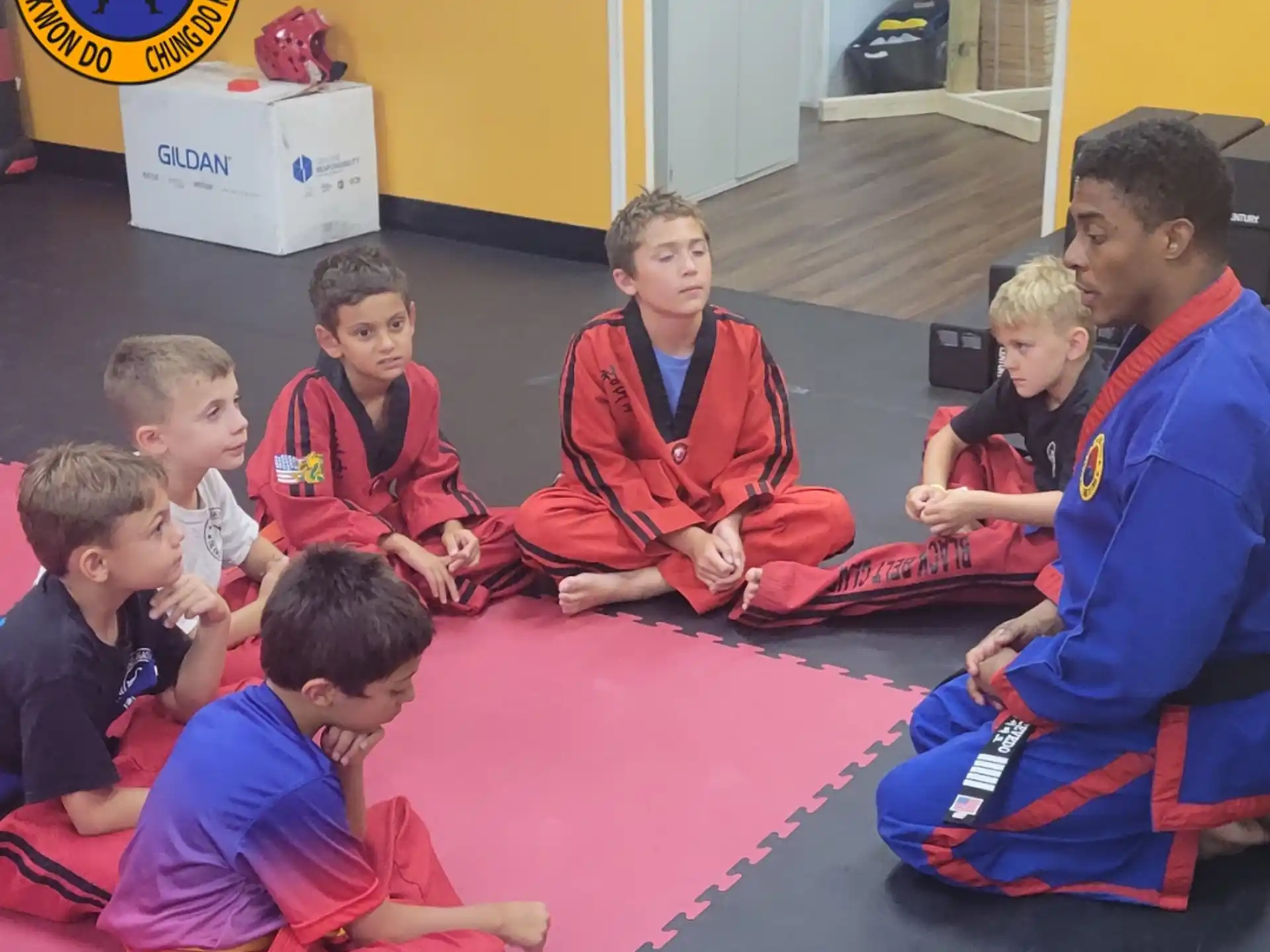 a group of children sitting on the floor