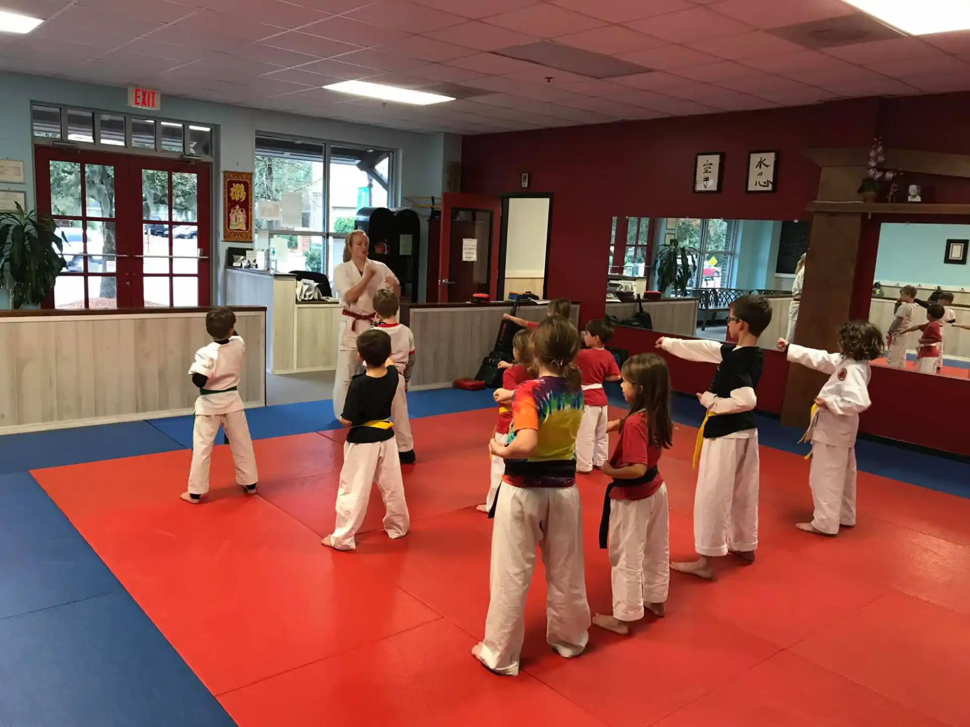 a group of children in a karate class