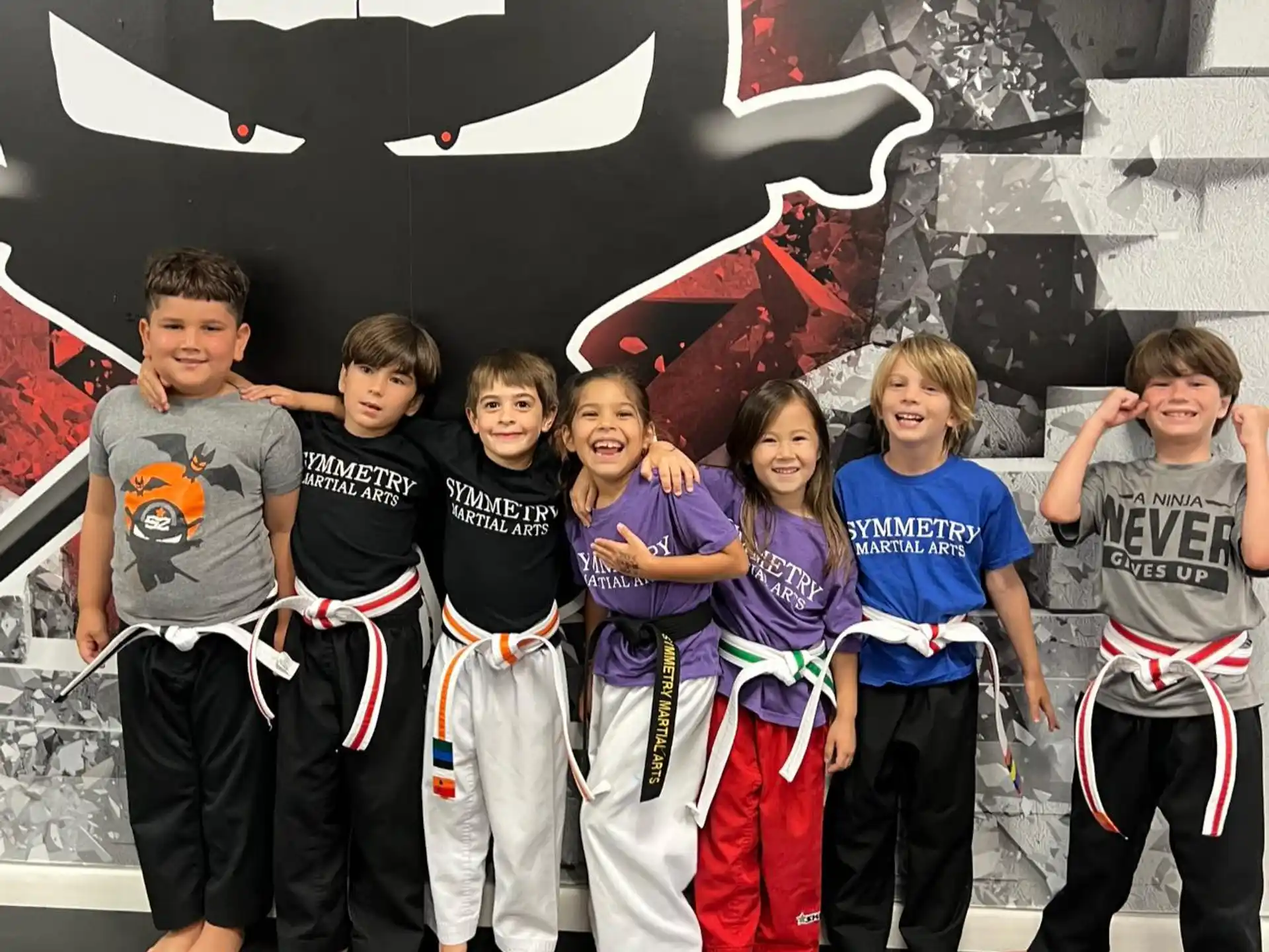 a group of children posing for a photo