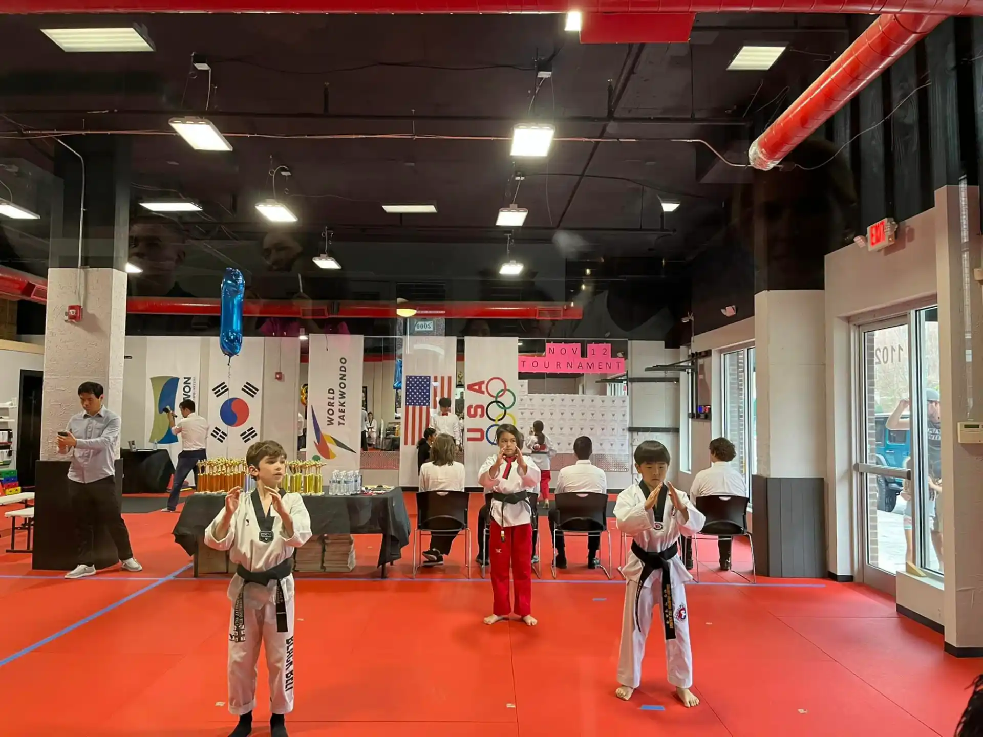 a group of people in karate uniforms