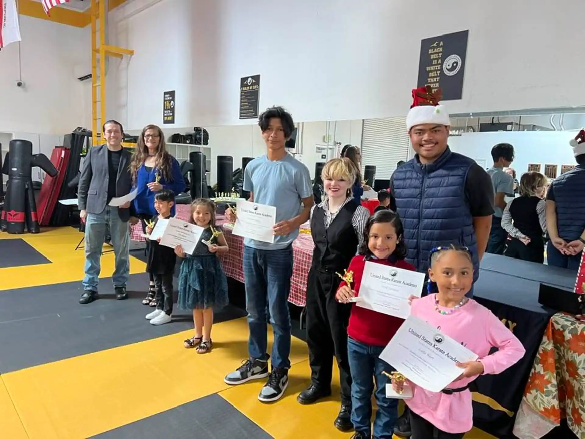 a group of people holding papers