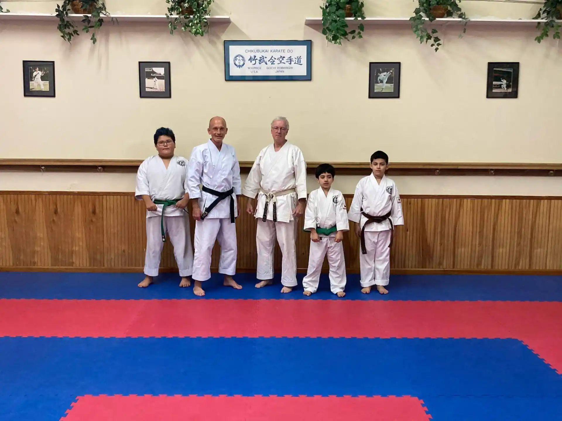 a group of people in karate uniforms