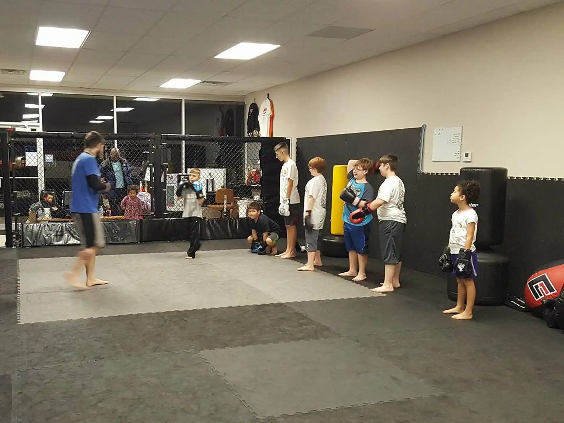 a group of people standing in a room