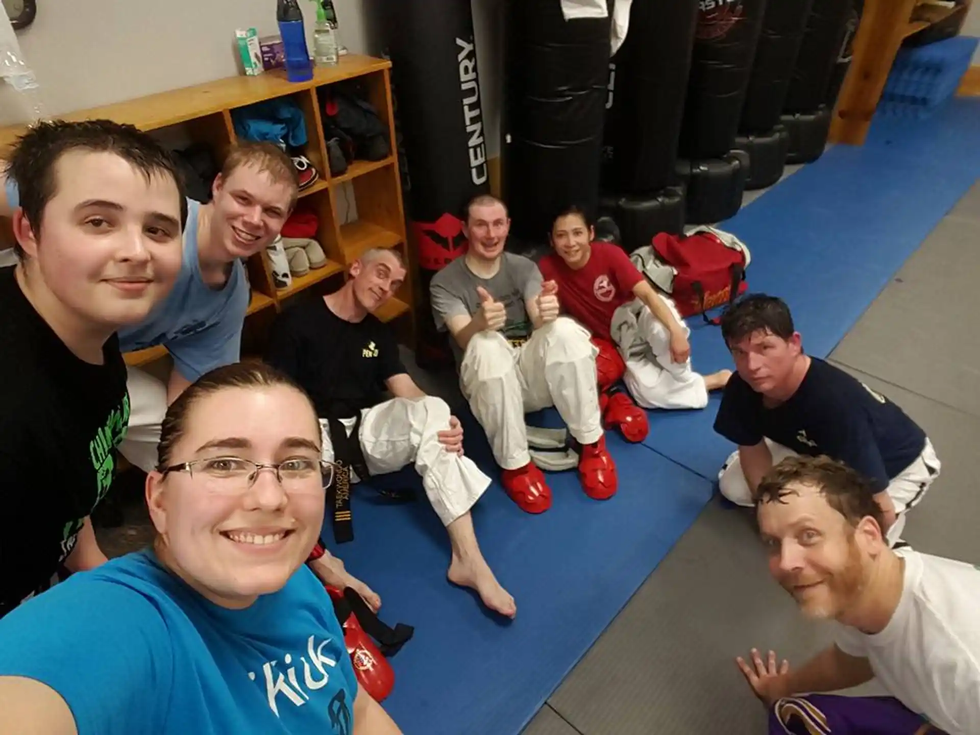 a group of people sitting on the floor