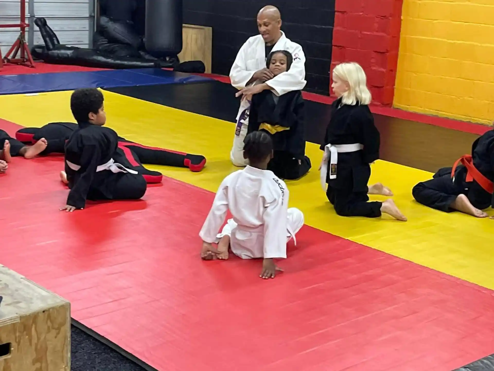 a group of people kneeling on the floor