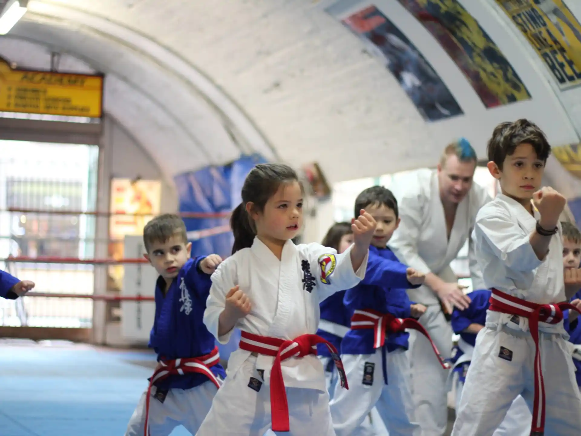 a group of people in karate uniforms