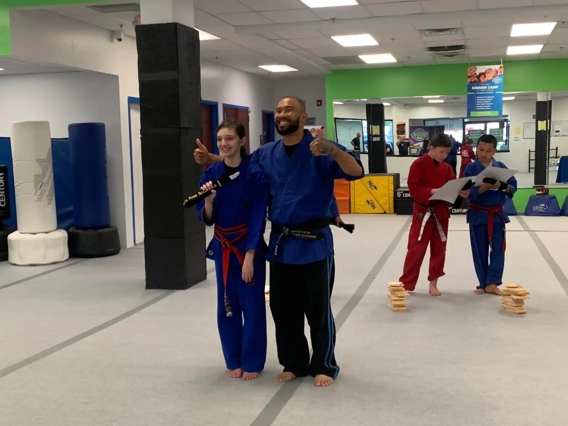 a group of people in martial arts uniforms