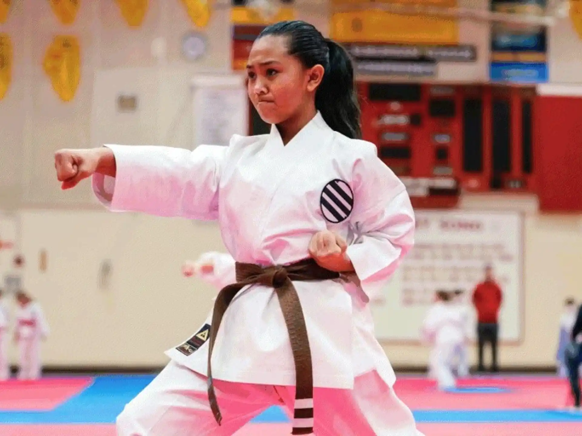 a person in a karate uniform