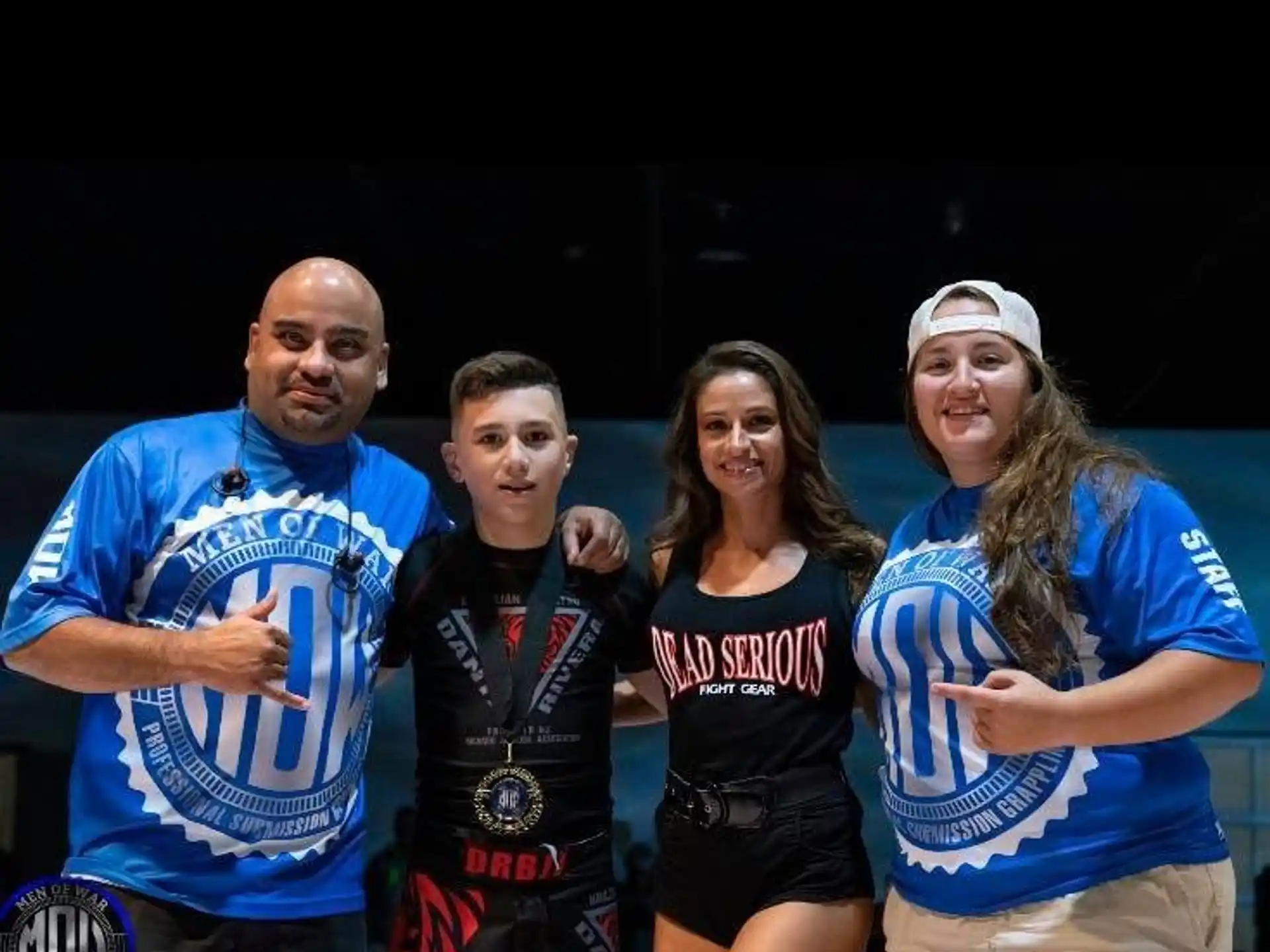 a group of people posing for a photo