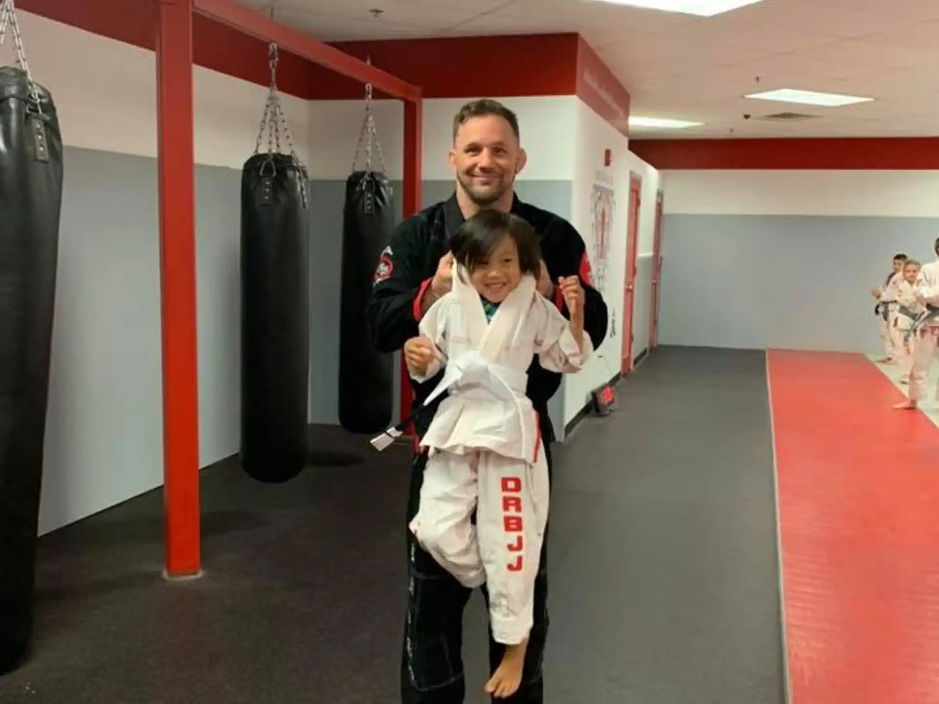 a person holding a child