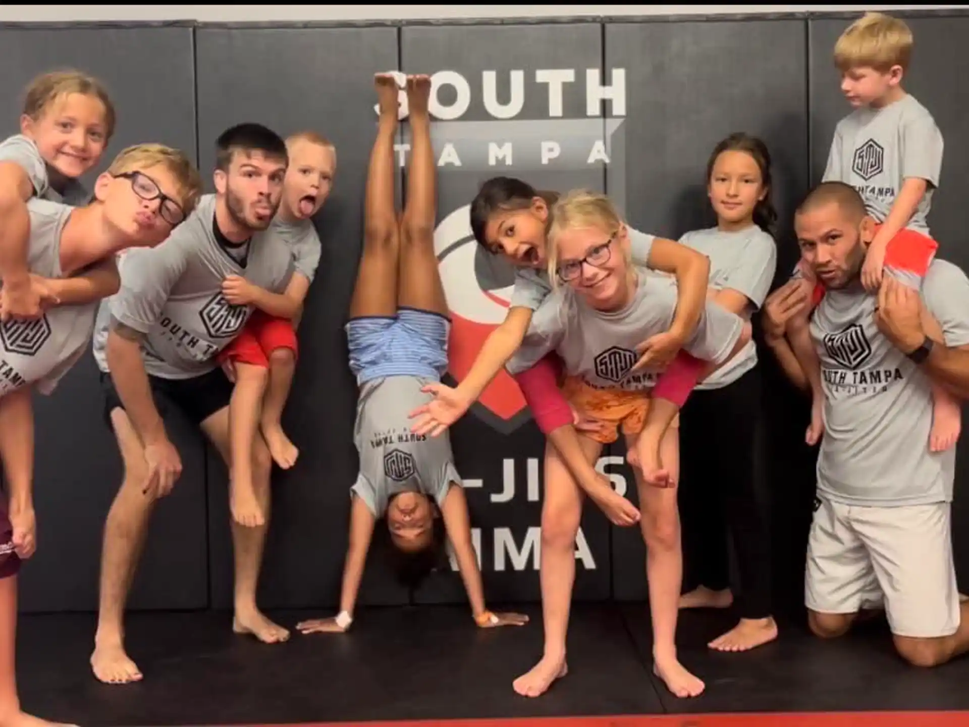 a group of people posing for a photo