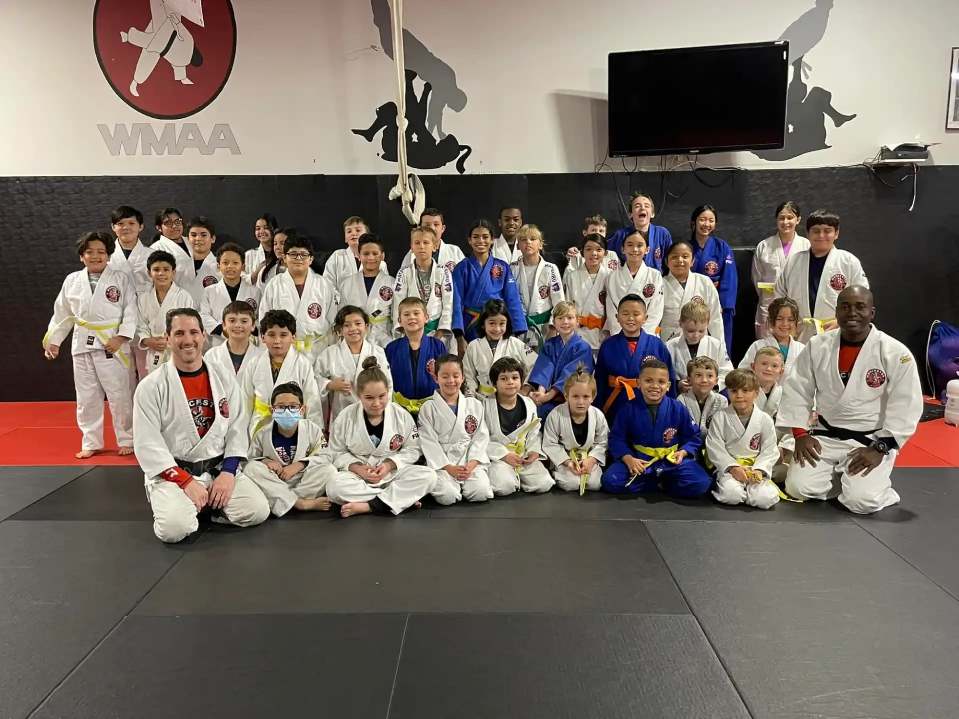 a group of people posing for a photo