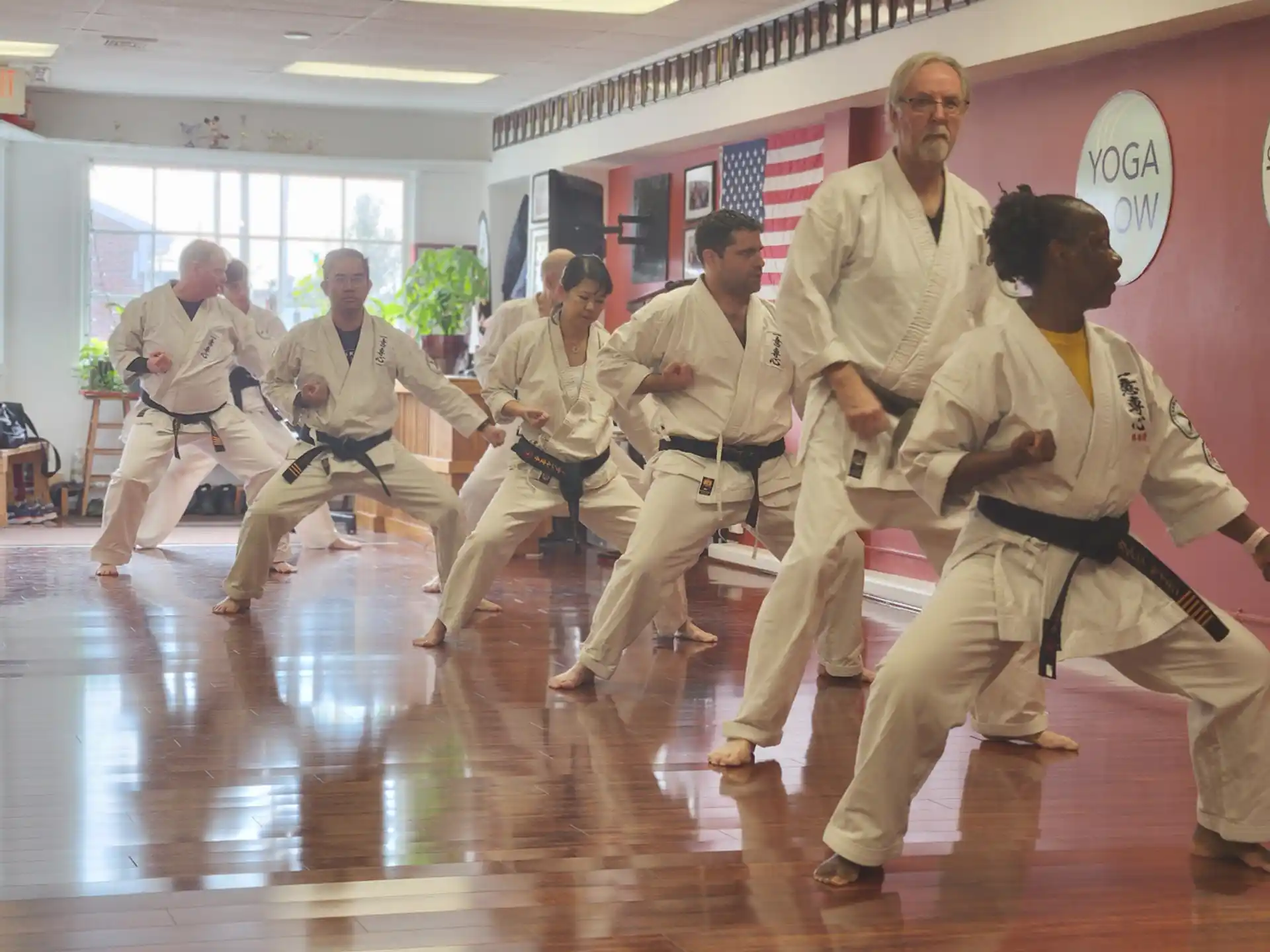 a group of people in karate uniforms