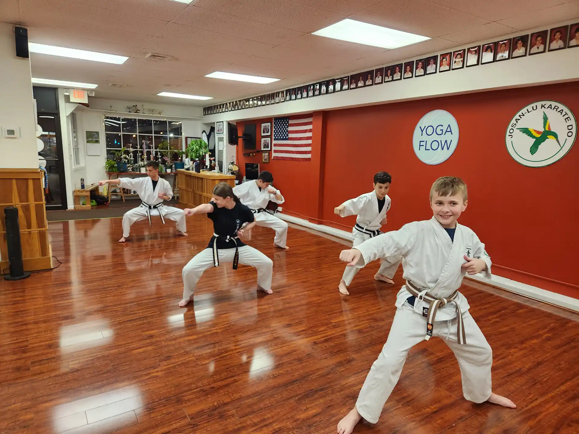 a group of people in karate uniforms