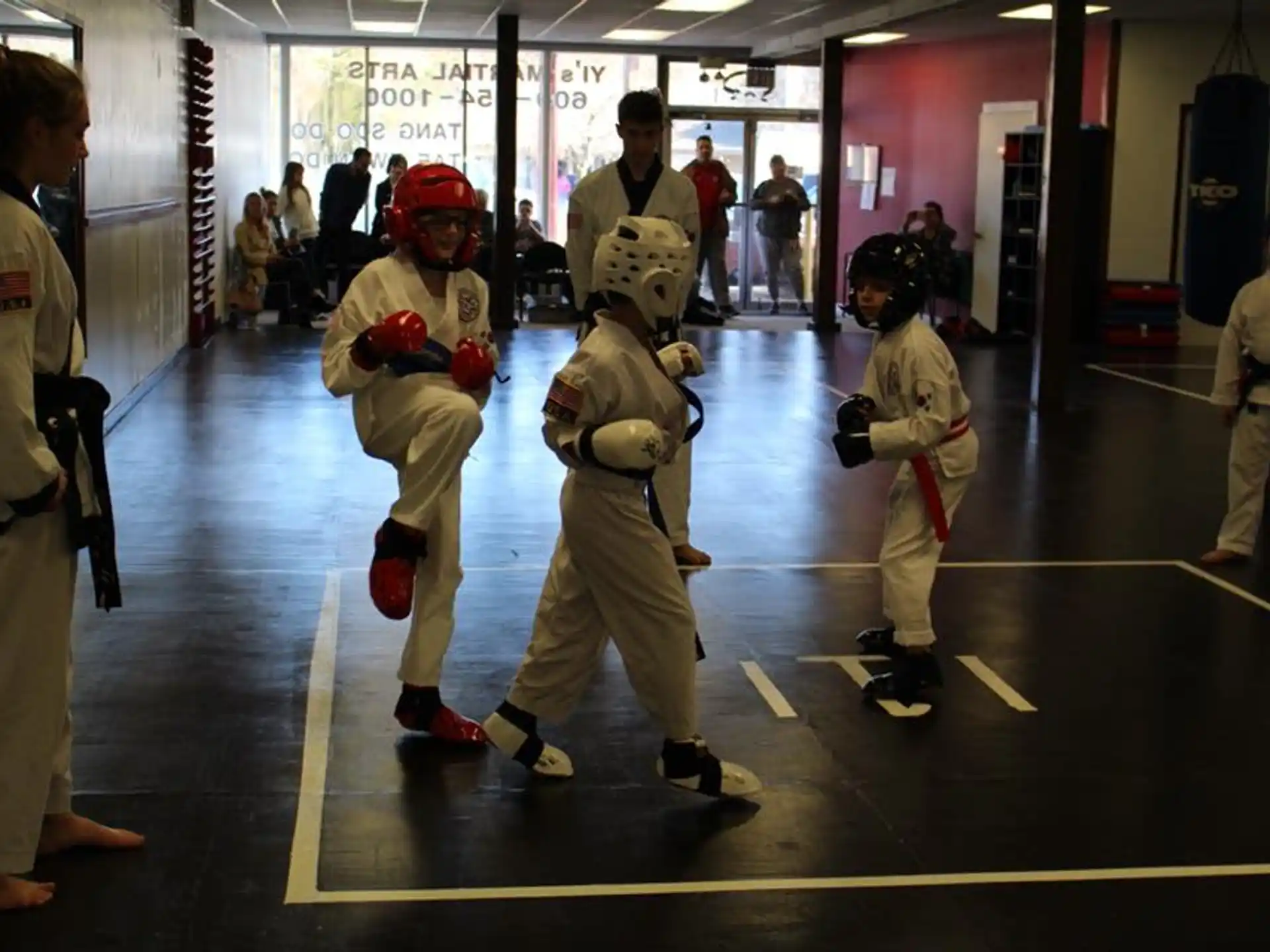 a group of people in white uniforms