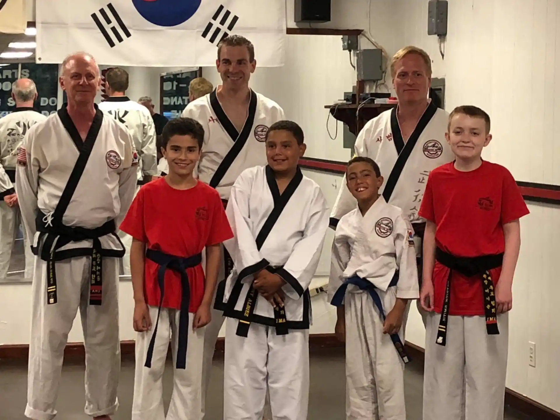 a group of people wearing karate uniforms